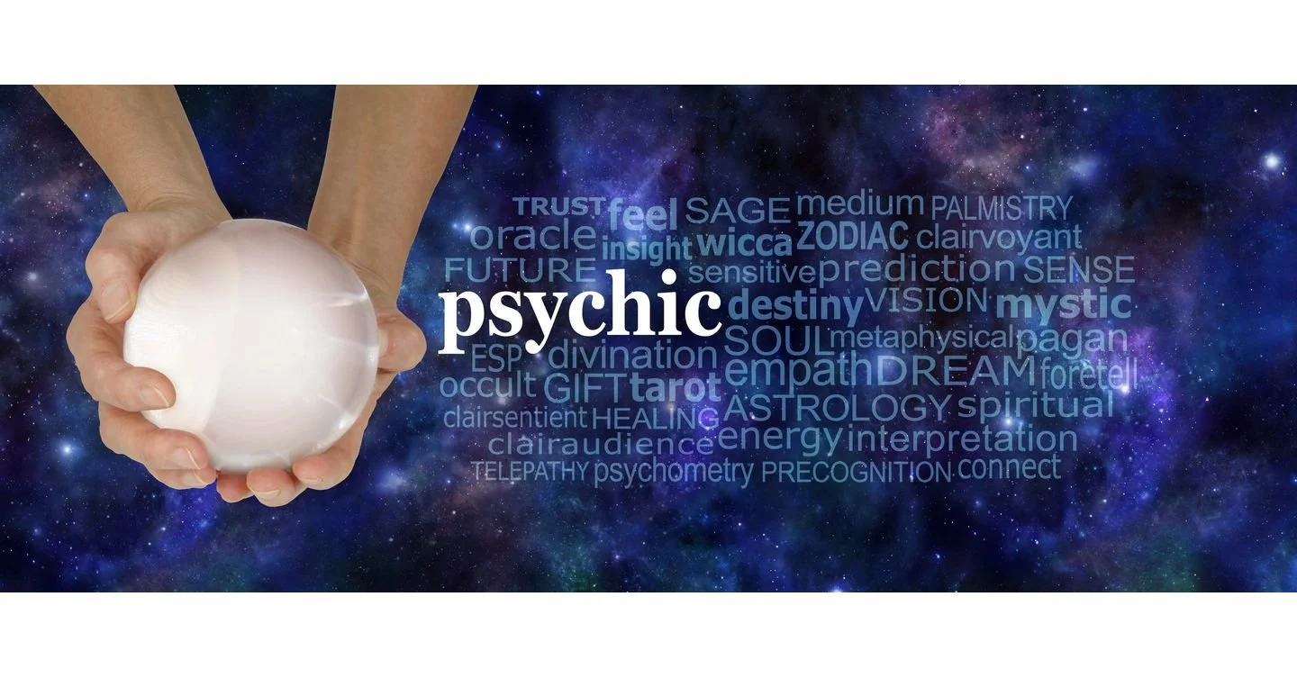 Hands holding a glowing crystal ball against a cosmic background with words related to psychic and spiritual practices, including 'psychic,' 'tarot,' 'destiny,' 'soul,' and 'astrology'.
