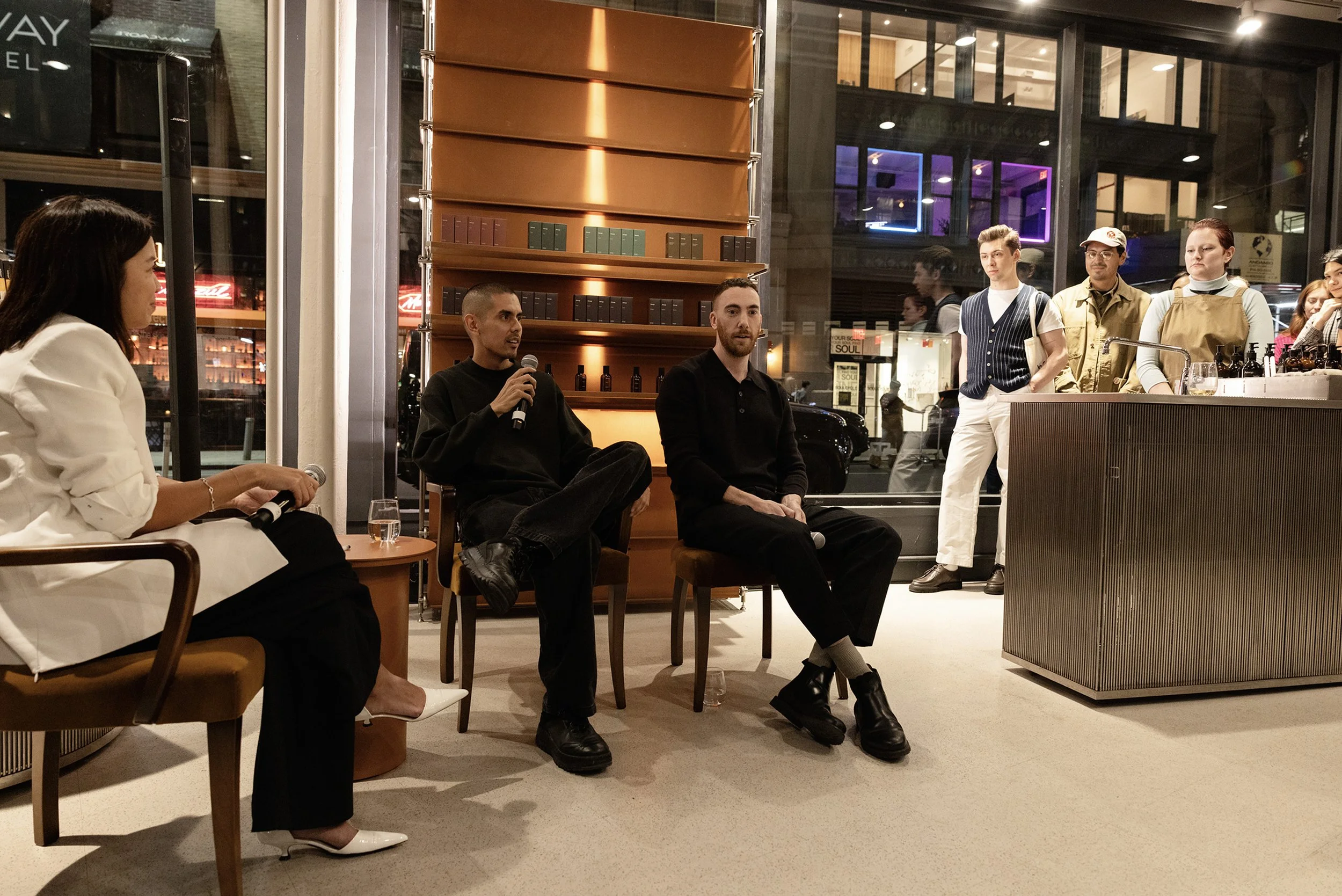 Panel discussion during an evening corporate brand event.