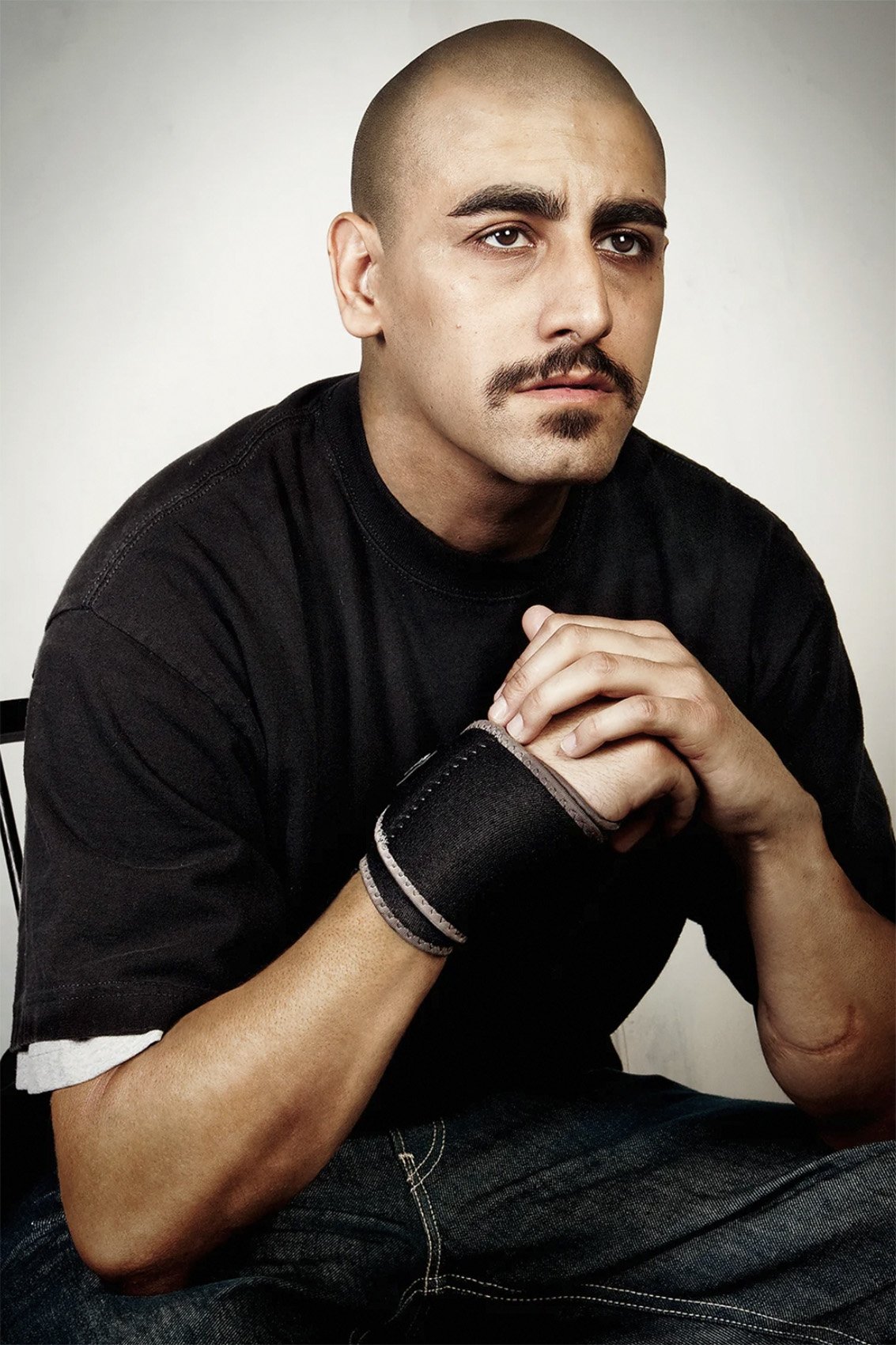 Portrait of David Williams with his tattoos digitally removed.