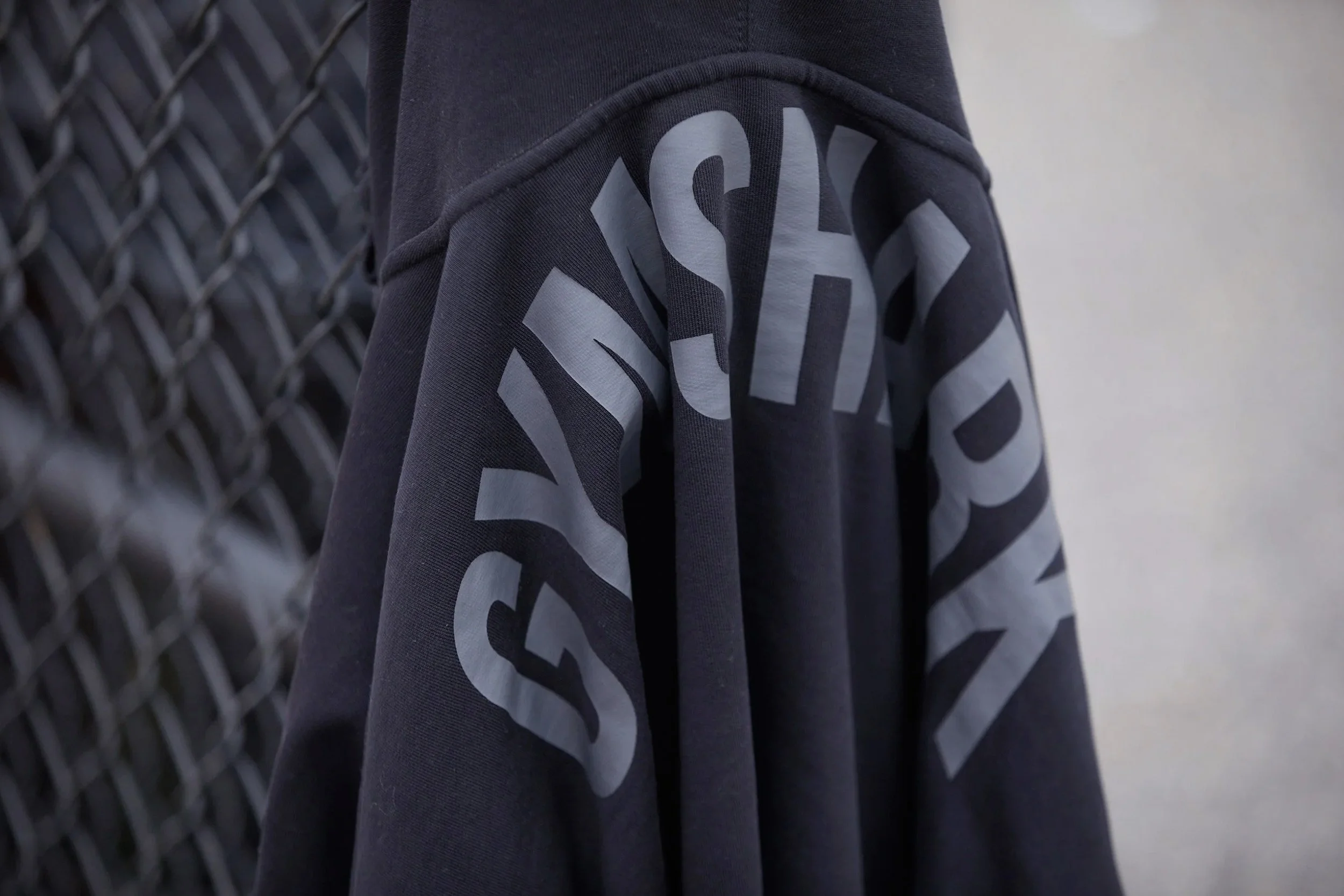 Close-up of black Gymshark branded apparel.