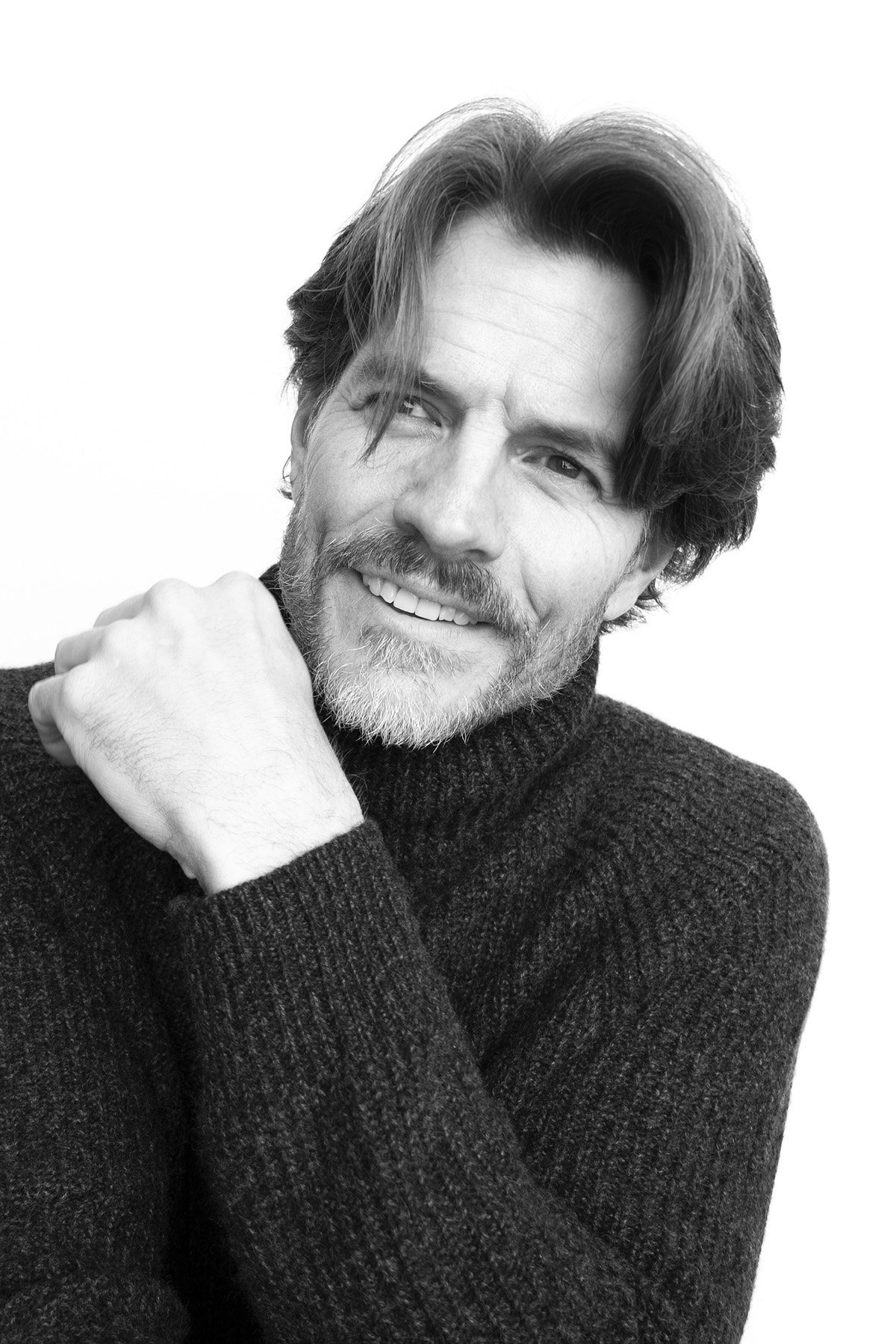 Black-and-white portrait of New York photographer Steven Burton.
