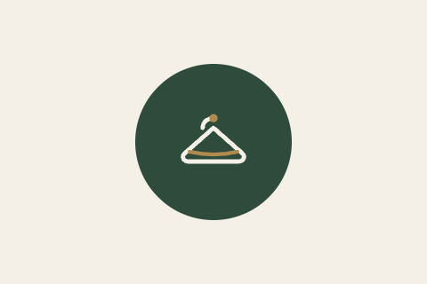 Clothes hanger icon on a dark green circle.