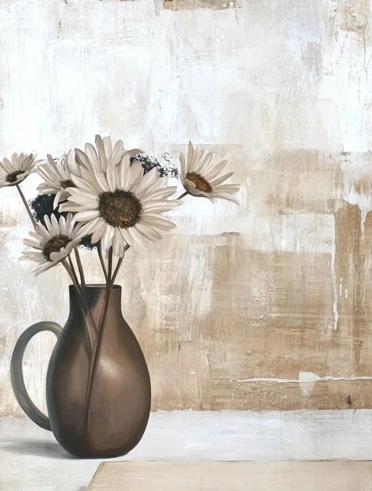 A dark brown ceramic vase holding white daisies with brown centers, placed on a light-colored surface against a textured beige wall.