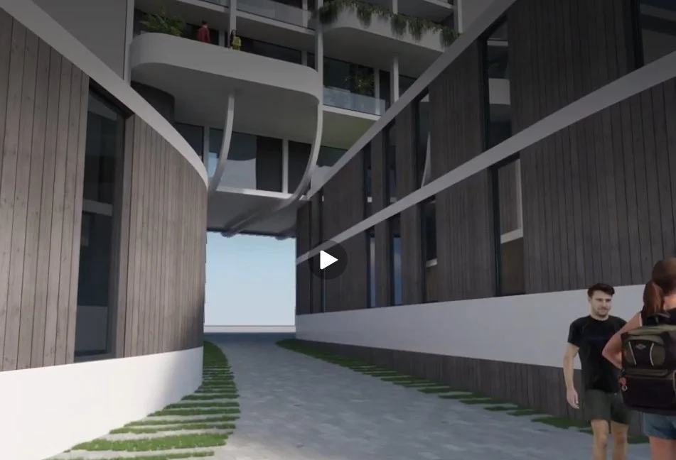 Modern multi-story apartment courtyard with wood-paneled walls, curved balconies, paved walkway, and two people