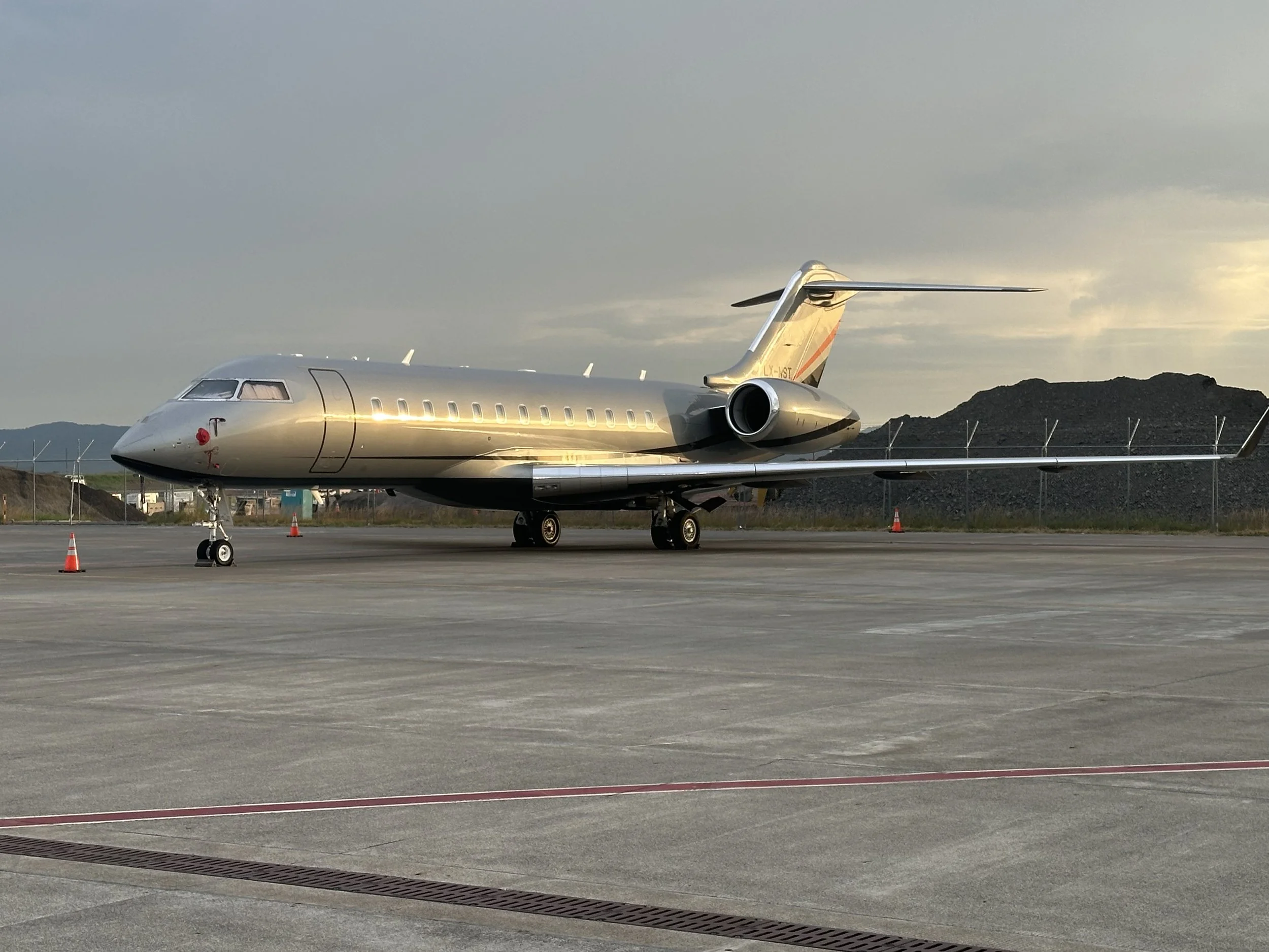 Business jet on the ramp at dusk