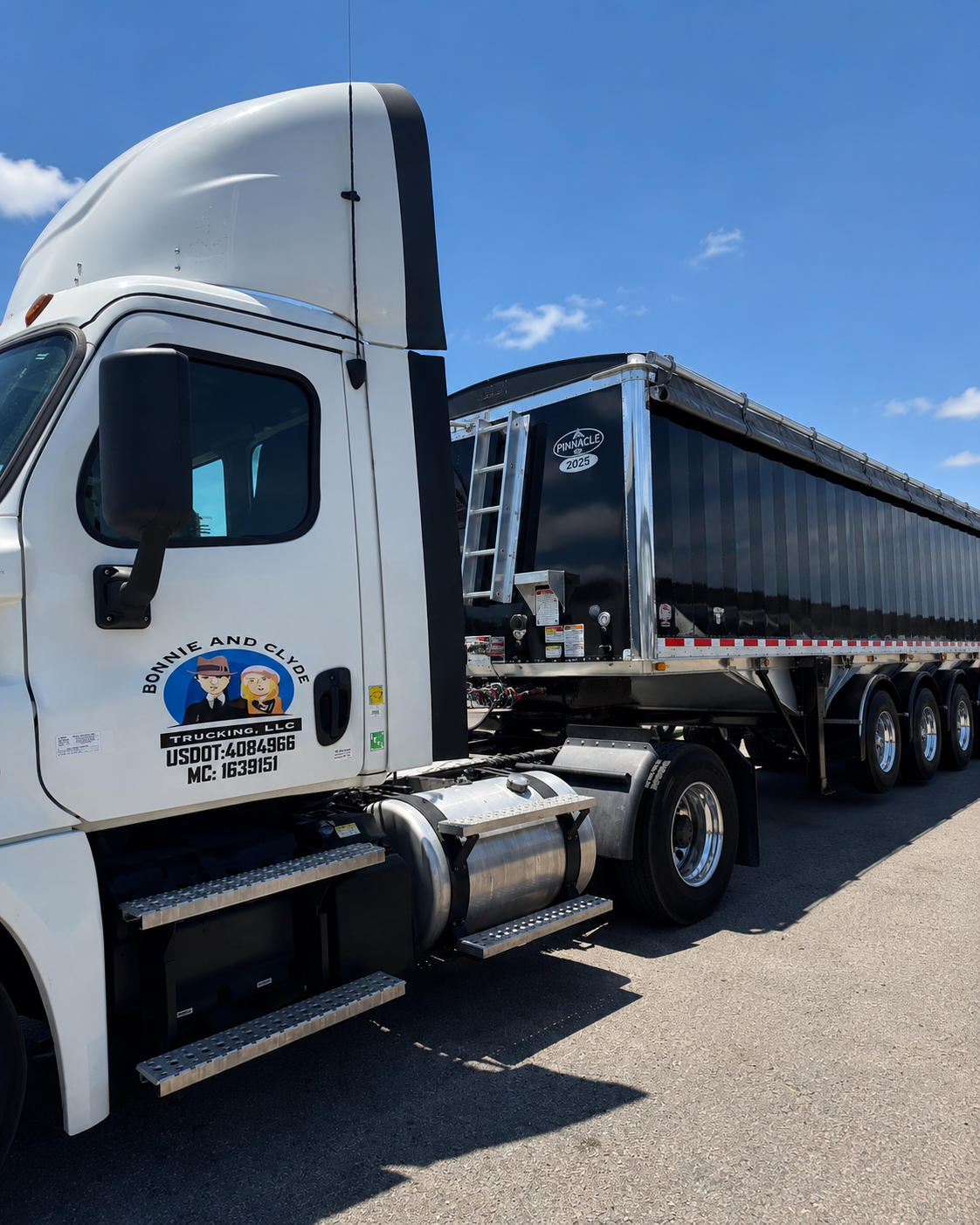 A white semi-truck with a black trailer parked on a paved road under a blue sky with some clouds. The truck has a logo for Bonnie and Clyde Trucking, LLC on the door.
