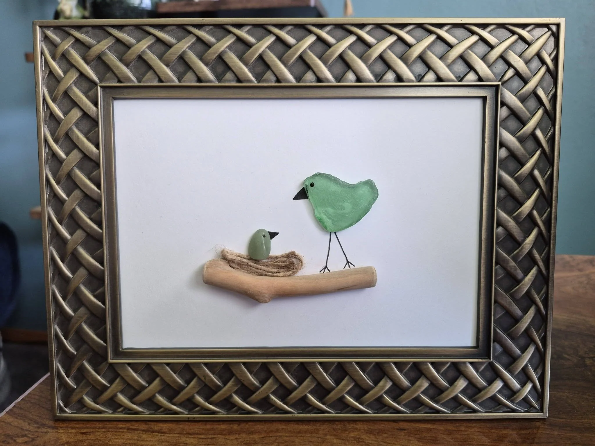 Handmade seaglass bird art in decorative frame