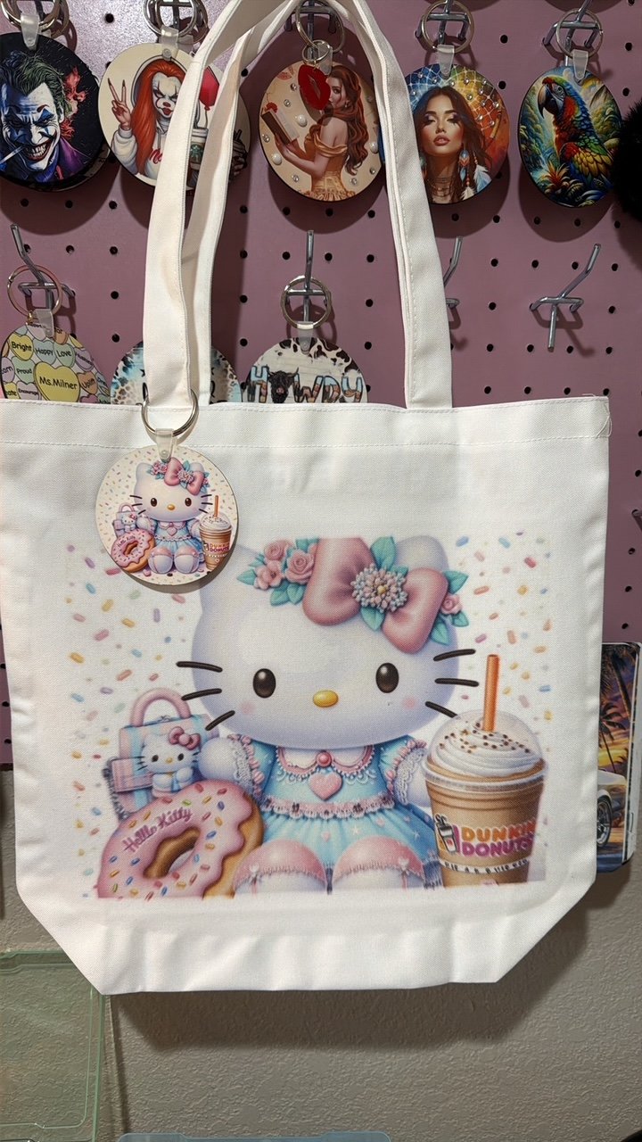 Handmade tote bag with Hello Kitty and donut design.