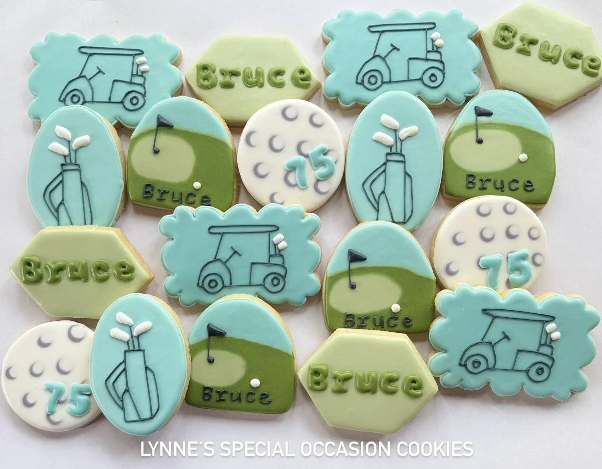 Handmade decorated sugar cookies with a golf theme, featuring golf carts, golf bags, putting greens, golf balls, and personalized cookies for a 75th birthday celebration.