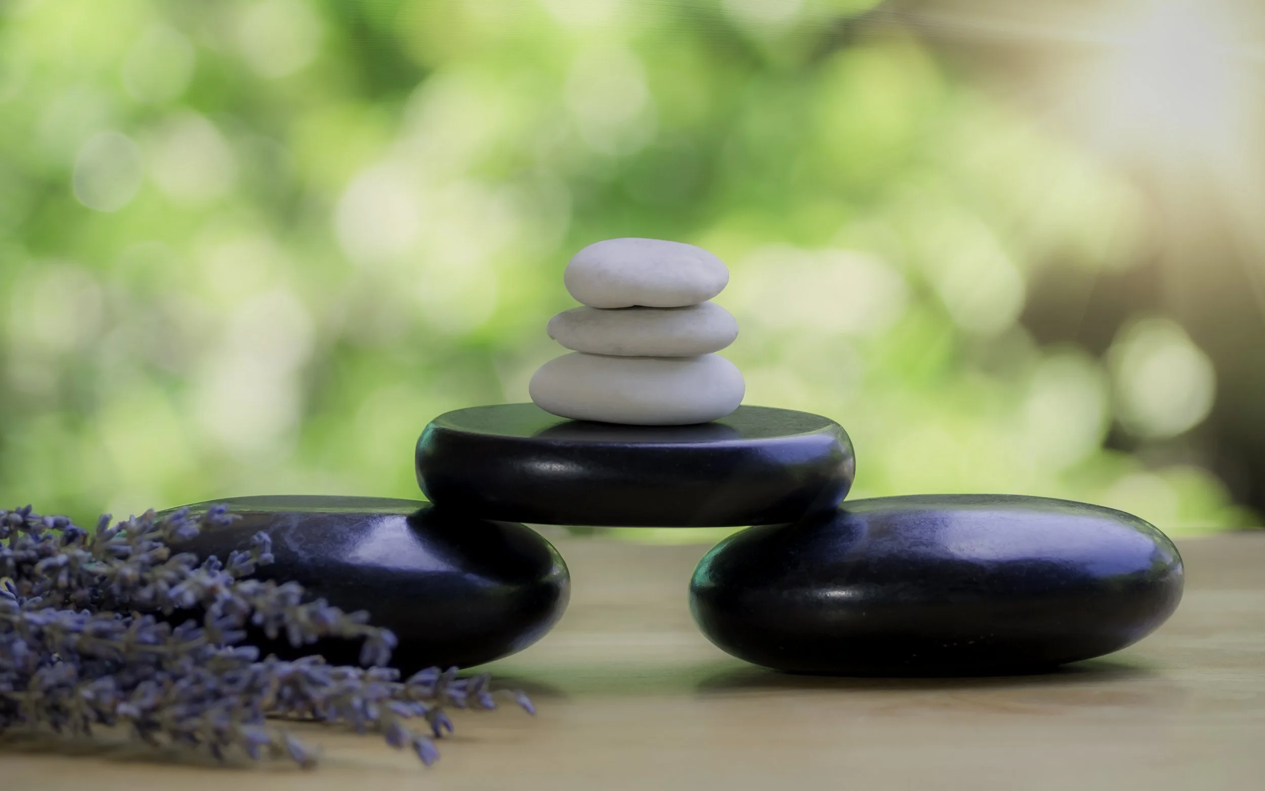 vecteezy_balance-and-wellness-or-health-concept-with-pile-of-black_11484743.jpg