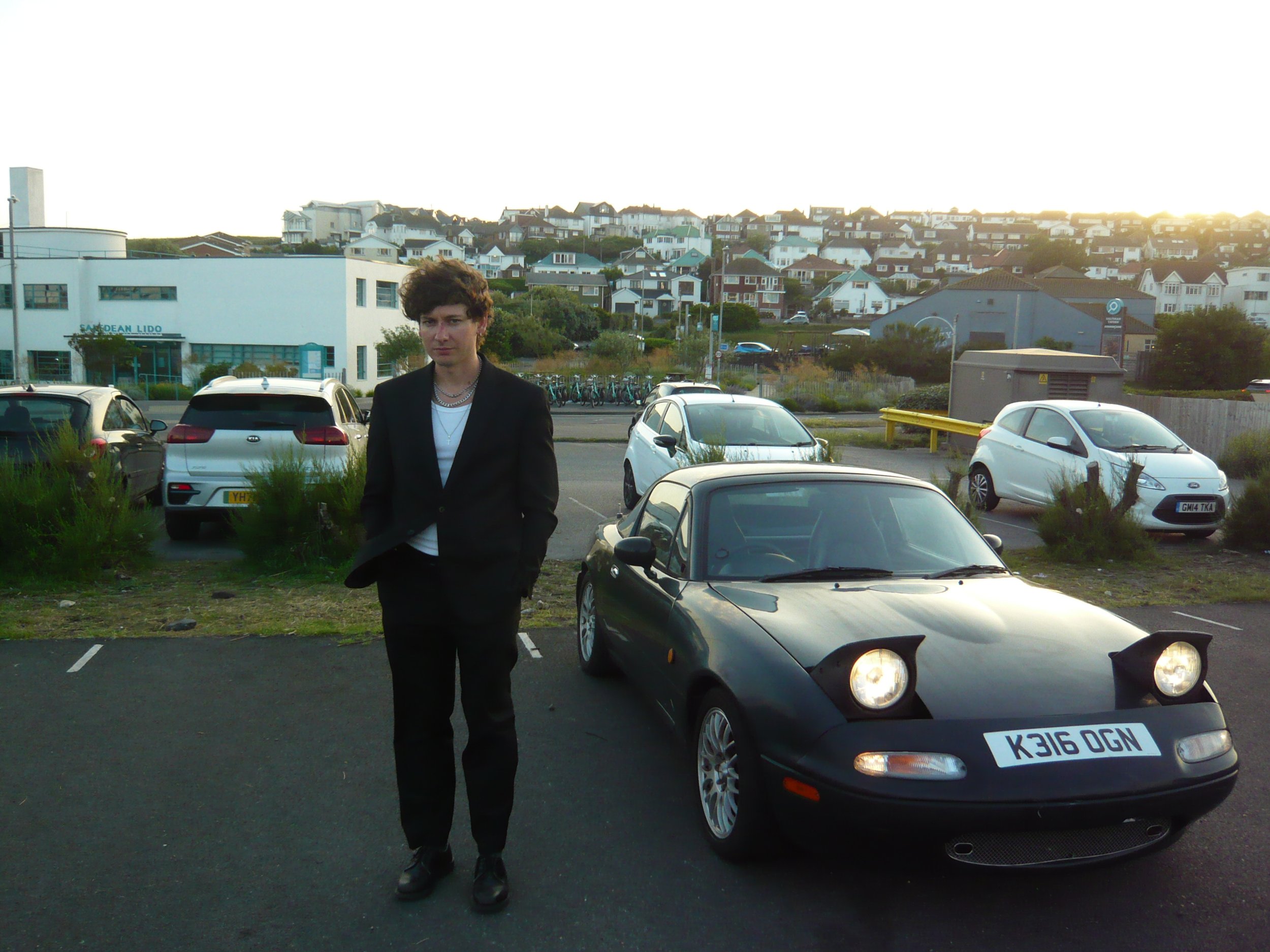 joe-little-suit-black-mazda-miata-mx5.jpg.JPG