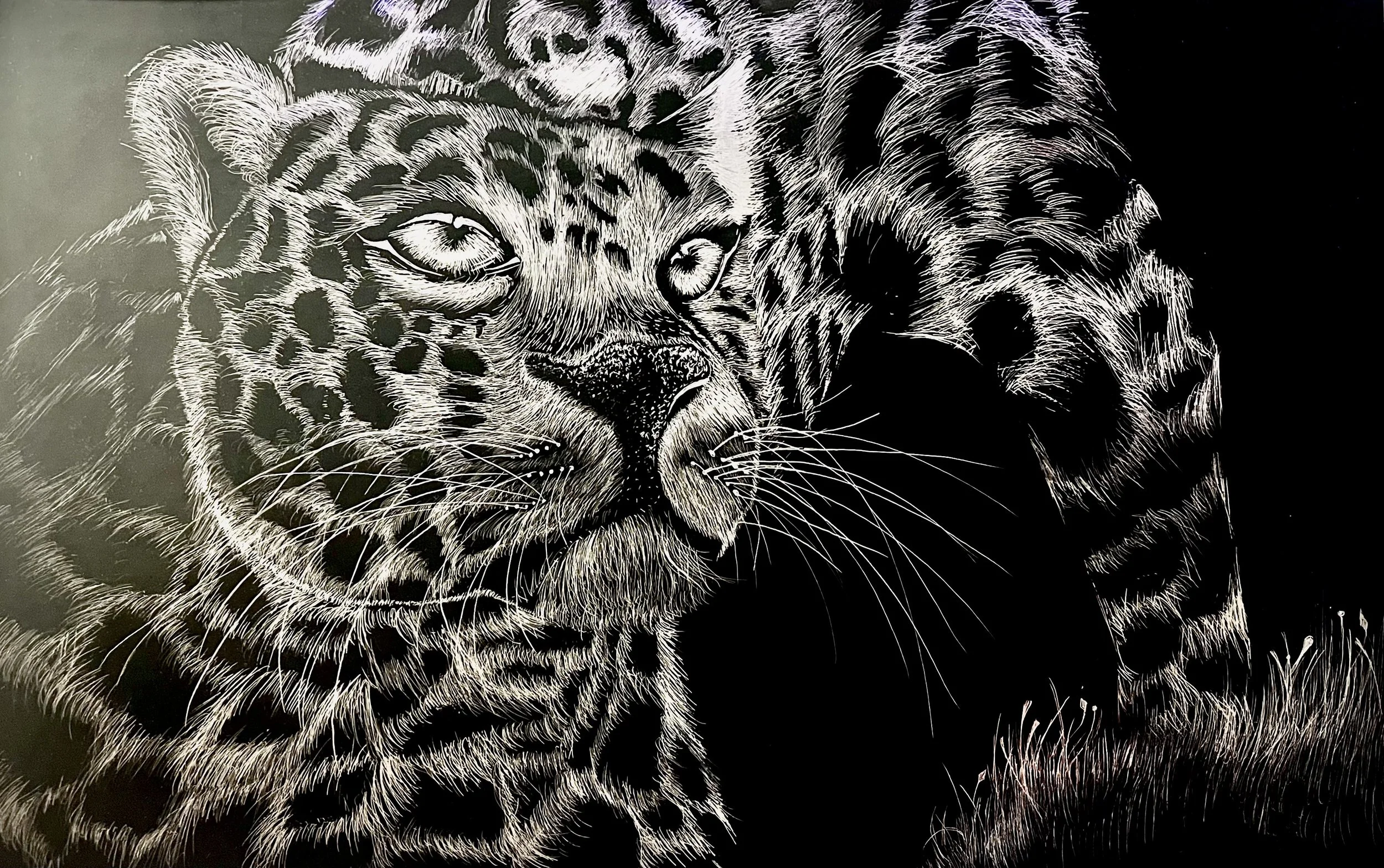 Black and white artwork of a leopard's face, stylized with intricate white line work on a black background.
