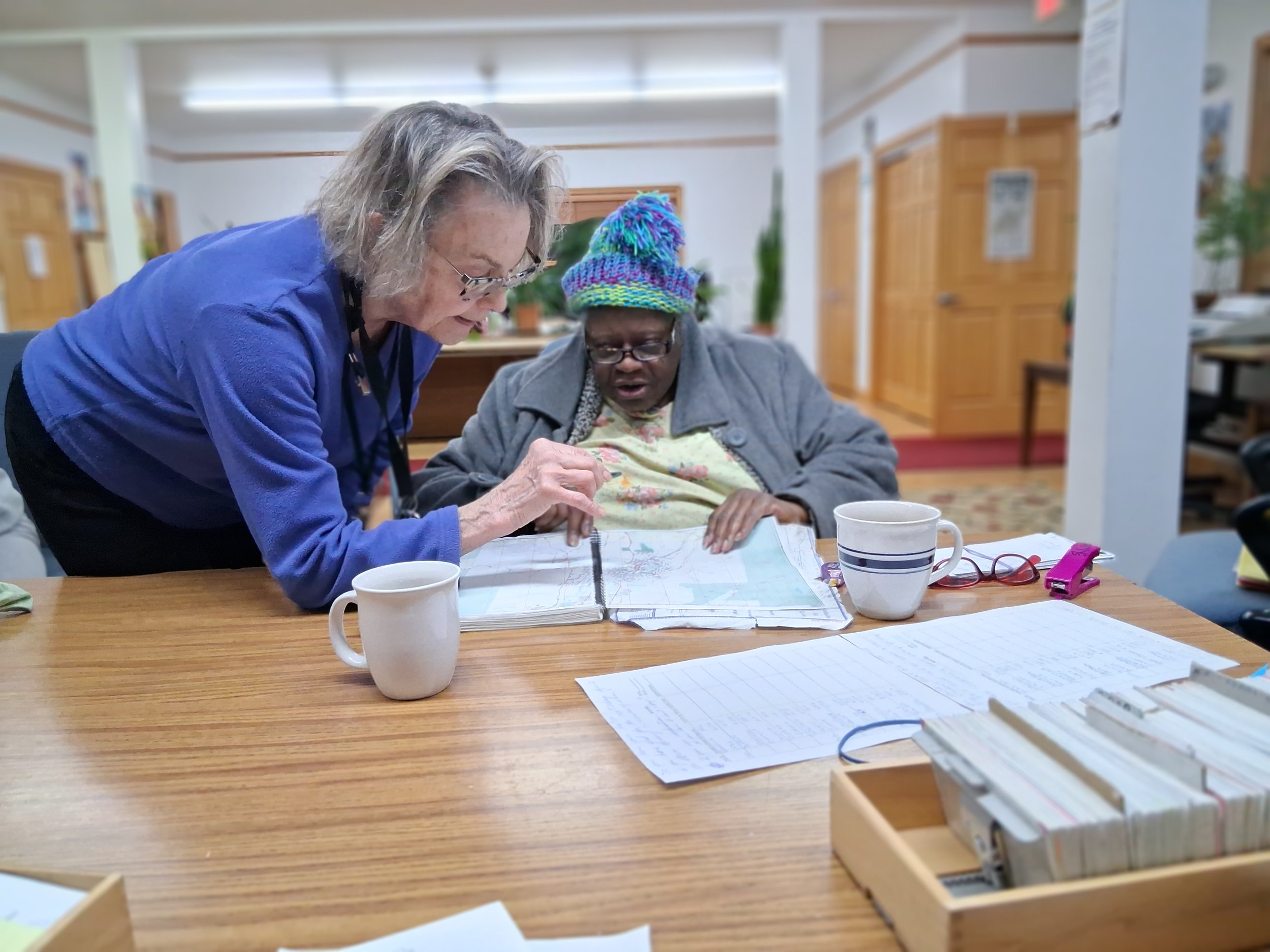 a volunteer advocating for a woman