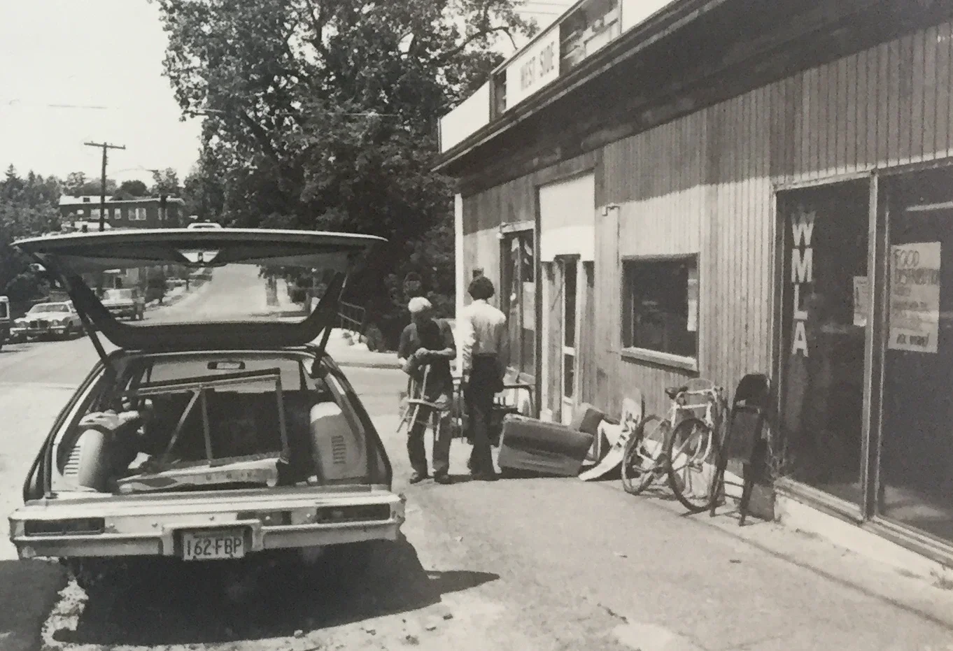 Picture of two men outside old WMLA office