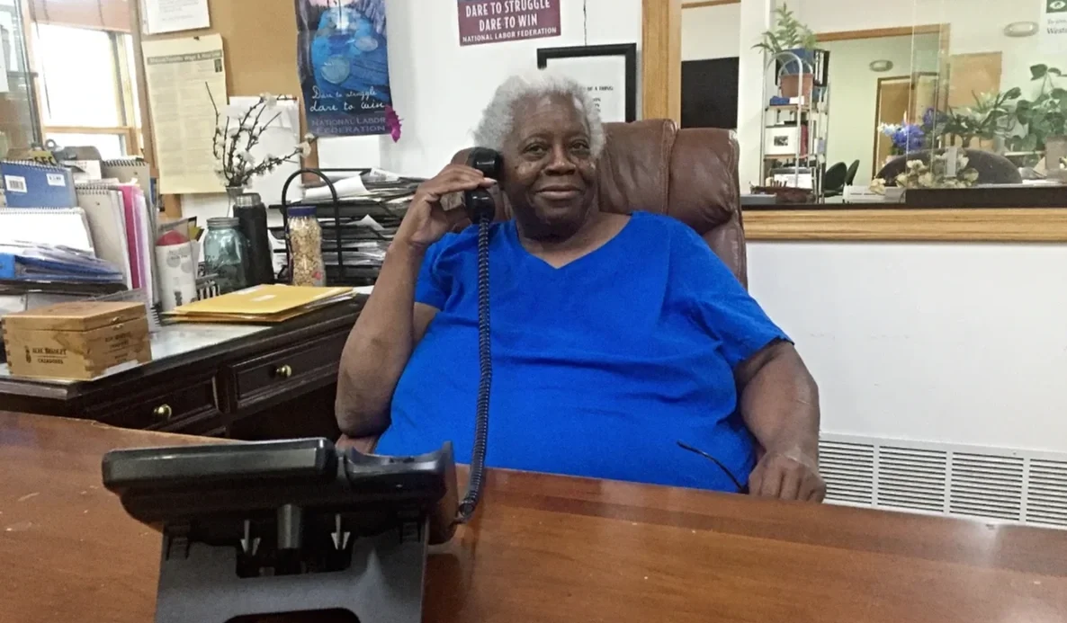 A woman answering a phone