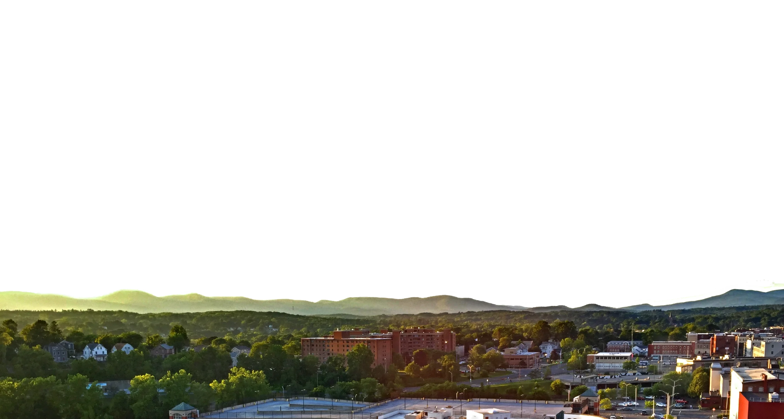Wide shot of Pittsfield and the Berkshire hills in the background.