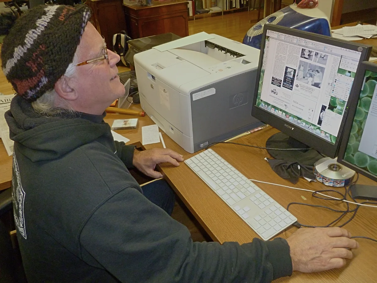 Man sitting in front of a computer