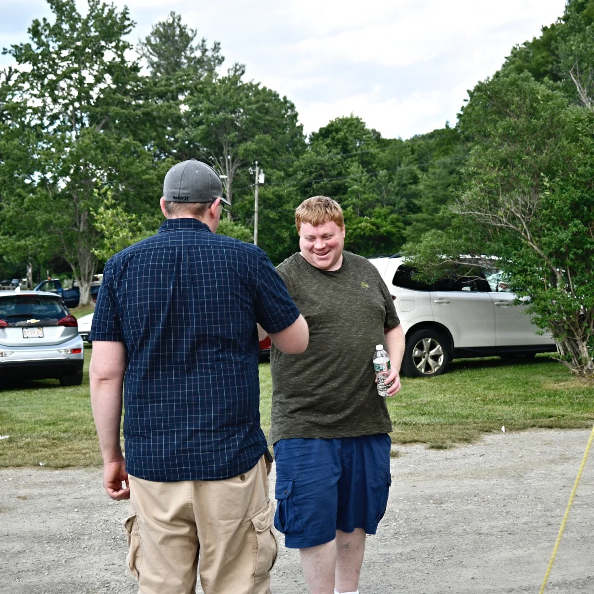 Two men greeting each other