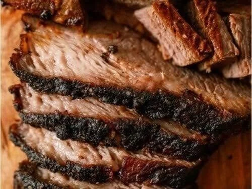 Close-up of sliced grilled steak with char marks