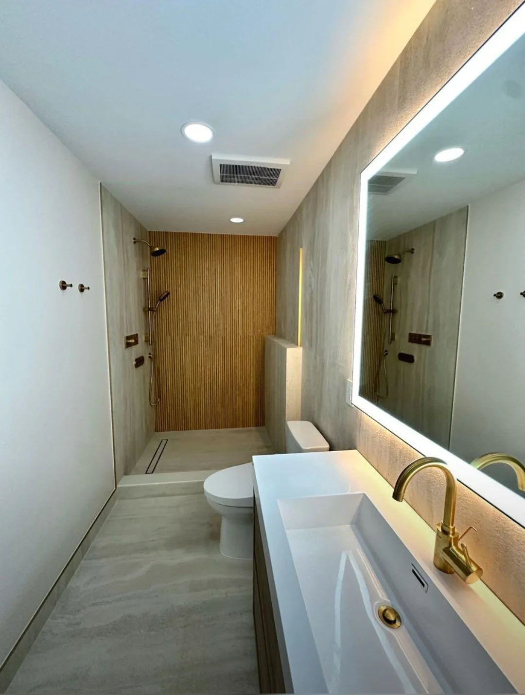 A spacious double-sink vanityoffers generous storage, clean lines, and a timeless design perfect for busy households.