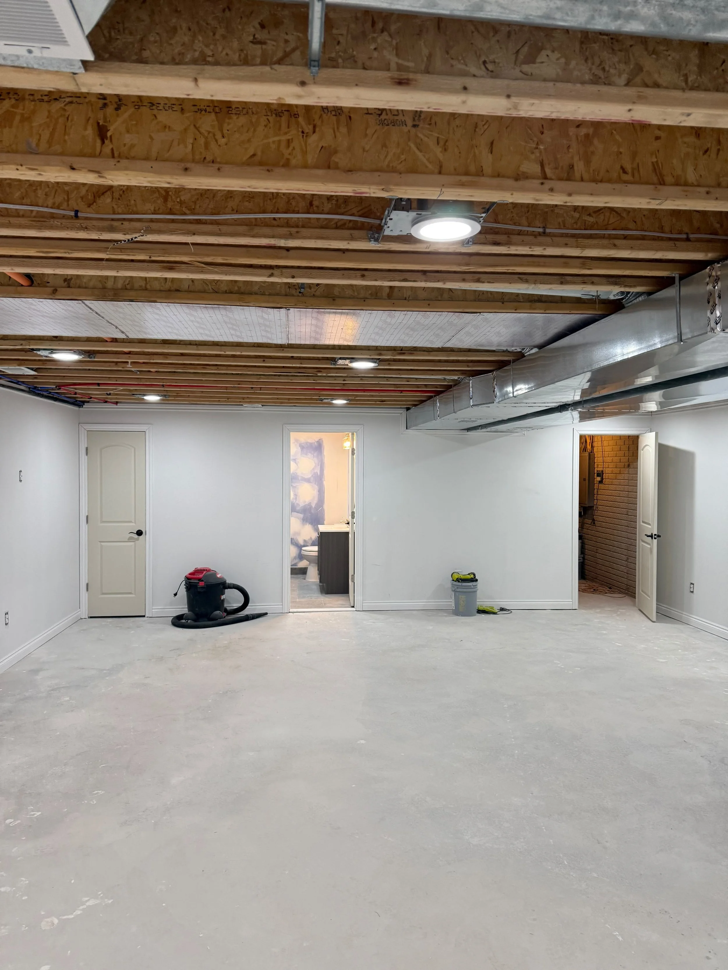 The completed basement offers a clean, modern, and inviting space that adds both comfort and long-term value to the home.