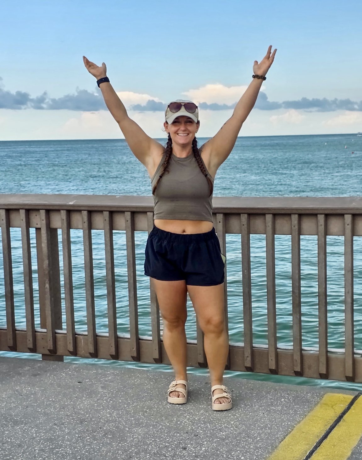 No weigh with Britt wellness coach beach raised arms