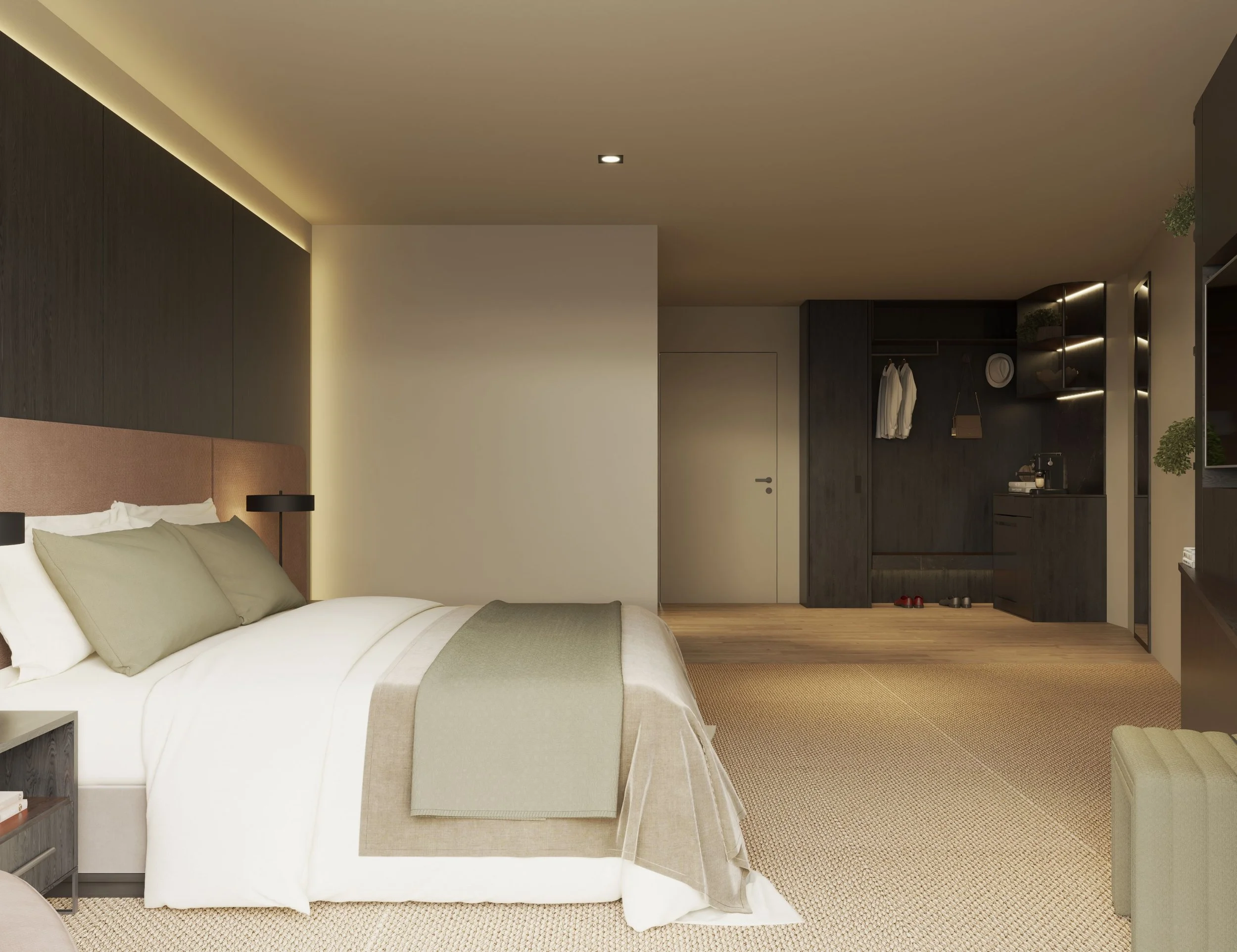 Executive Suite bedroom and living space at The Alfred Hotel