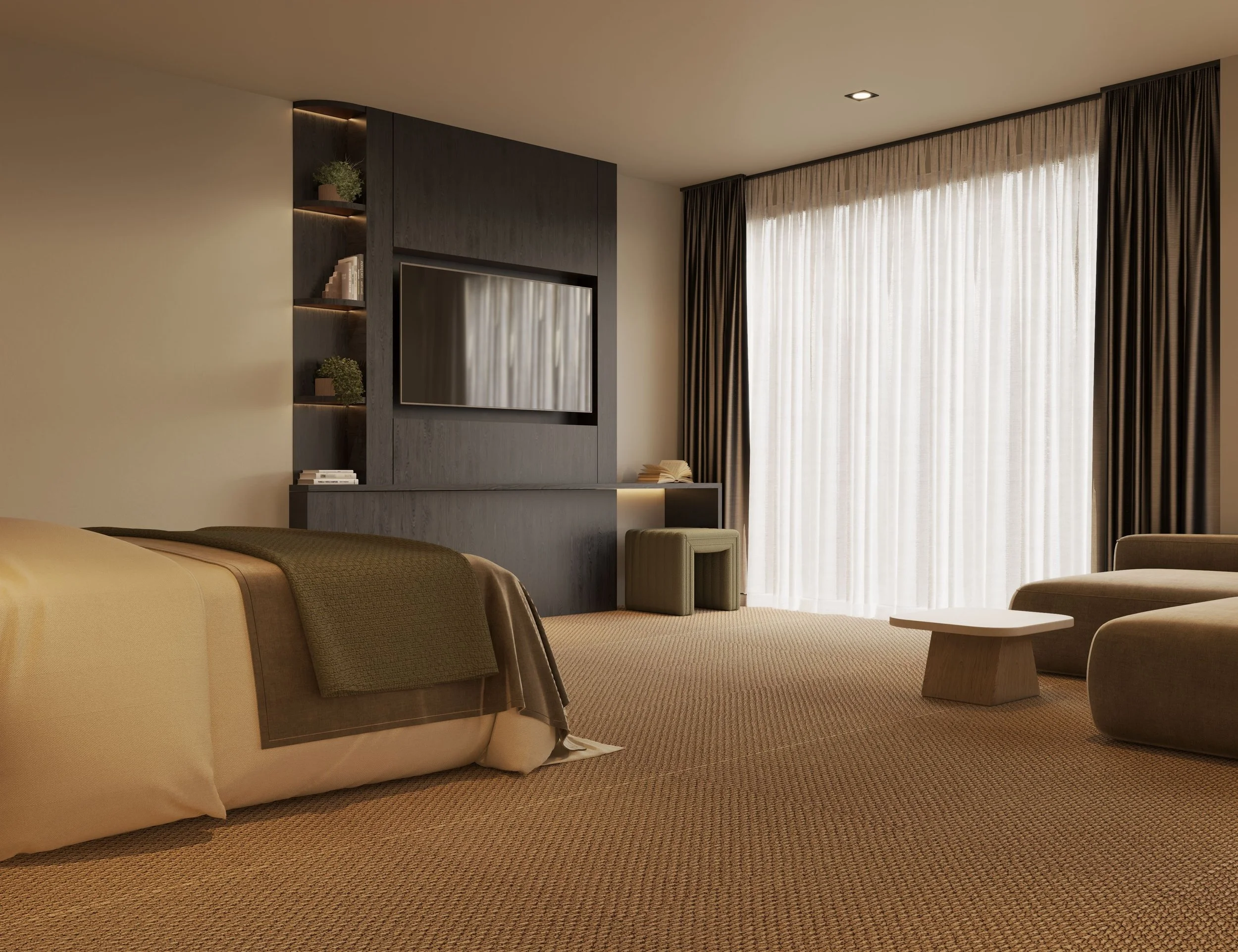 Modern hotel or apartment living room with beige carpet, beige and brown furniture, a large window with sheer and dark curtains, a wall-mounted flat-screen TV, and built-in shelves with plants and books.