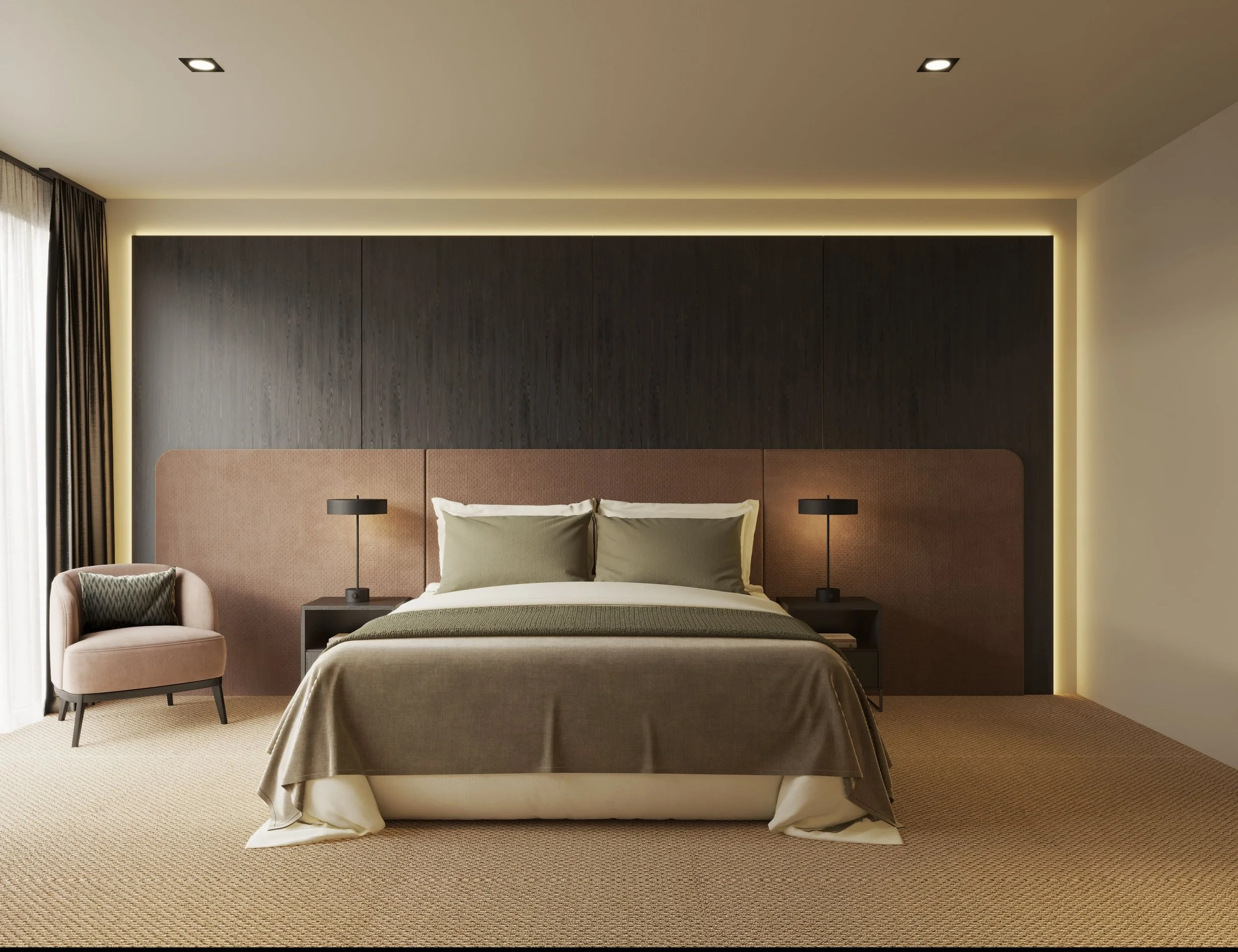 A modern bedroom with a bed featuring a beige bedspread, two pillows, and a blush pink headboard. There are two black bedside lamps on either side of the bed. To the left, there's a cream-colored armchair with a gray and white throw pillow. The room 