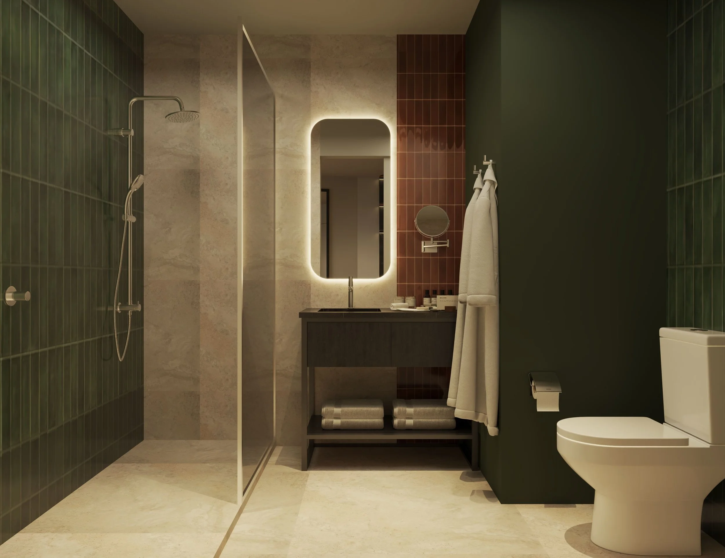 Modern bathroom with a walk-in shower on the left with green tiles, a large backlit mirror above the sink, and a white toilet on the right, with neutral tones and minimal decor.