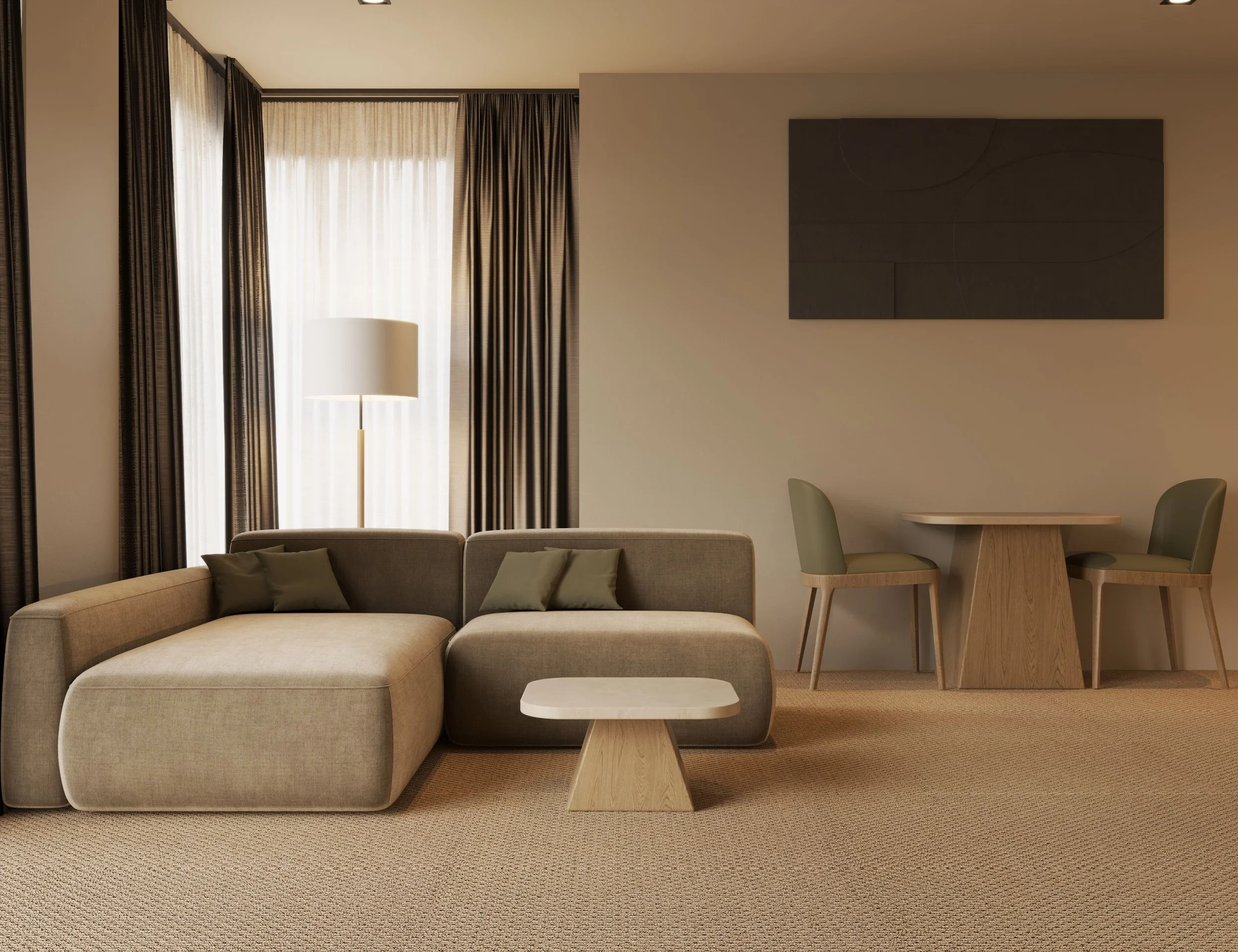A modern living room with beige sectional sofa, window with beige curtains, standing white floor lamp, a wooden side table, and a dining area with two chairs and a table. There is a large dark artwork on the wall.