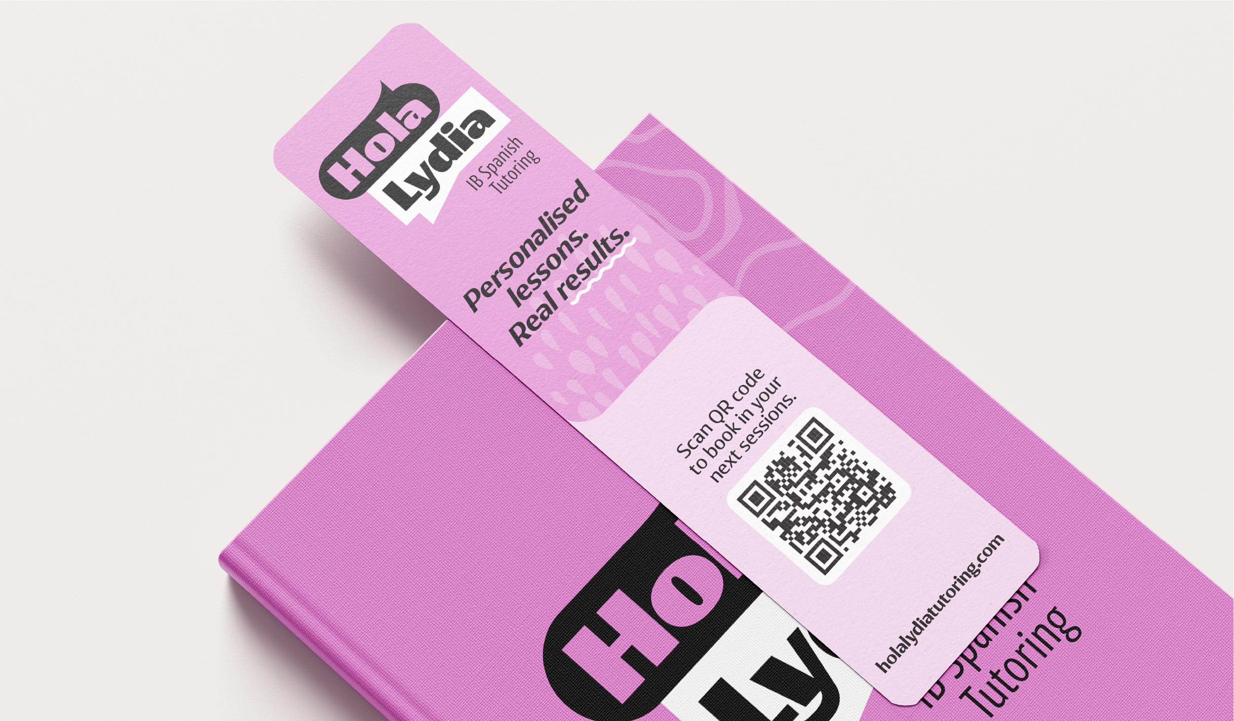 Pink book titled 'Hello Lydia' with a guide for personalized lessons and a QR code to book sessions.
