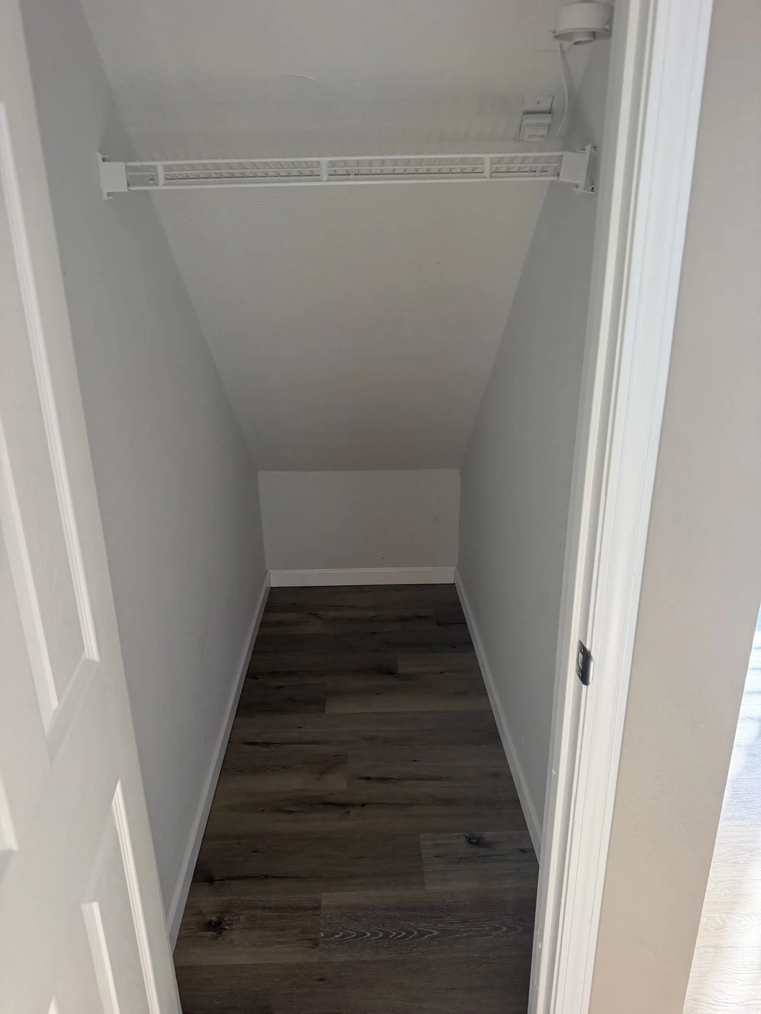  Under-stair storage closet in a Lebanon, MO rental home. 