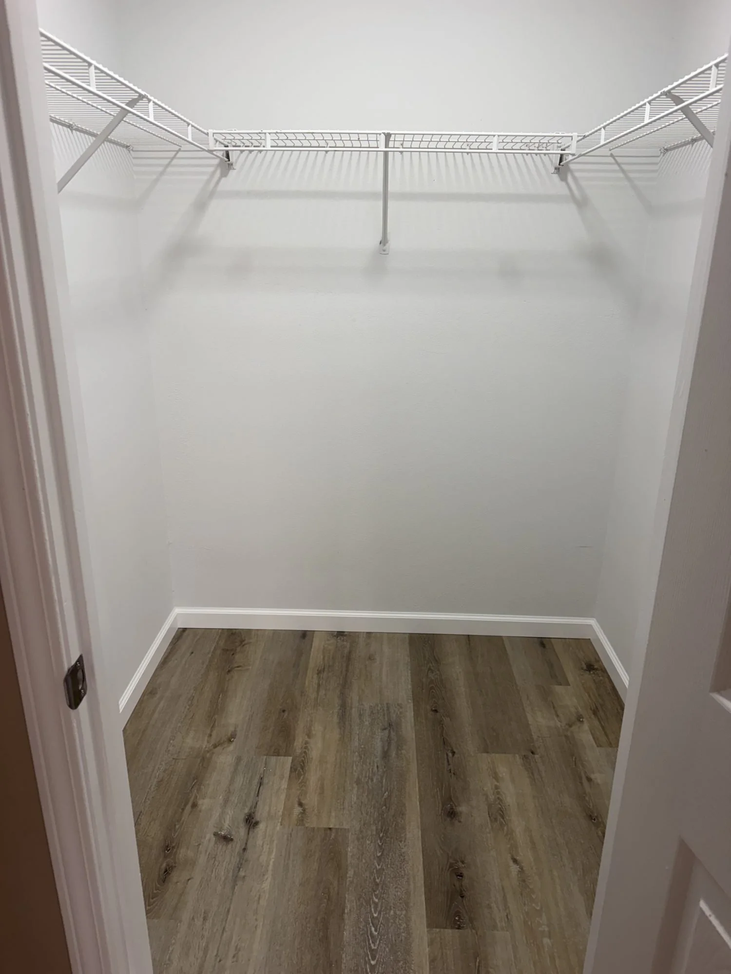  Walk-in closet with wire shelving, Lebanon MO townhouse rental. 