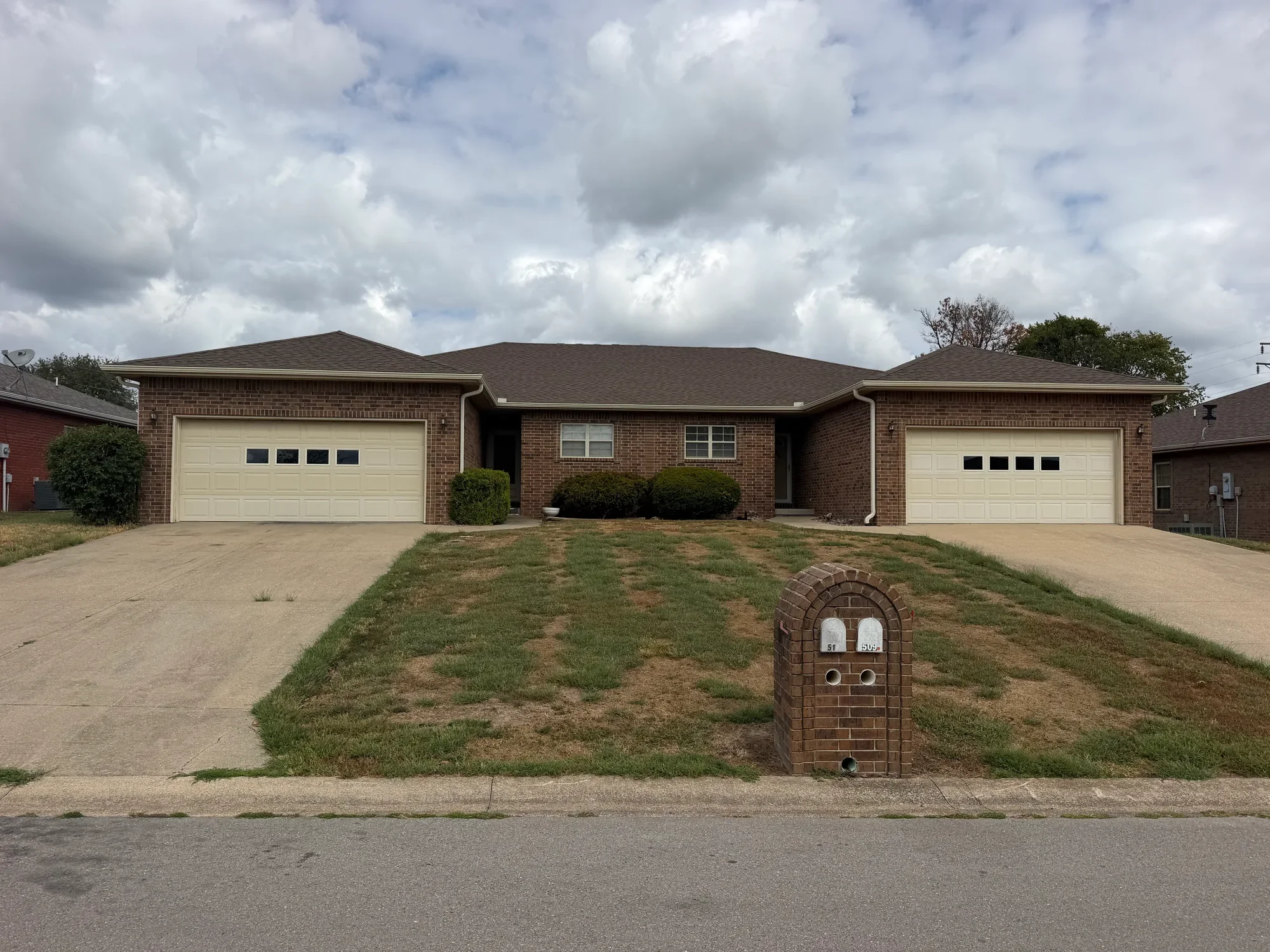  Brick home with attached two-car garage at 511 Zachary in Lebanon, MO 