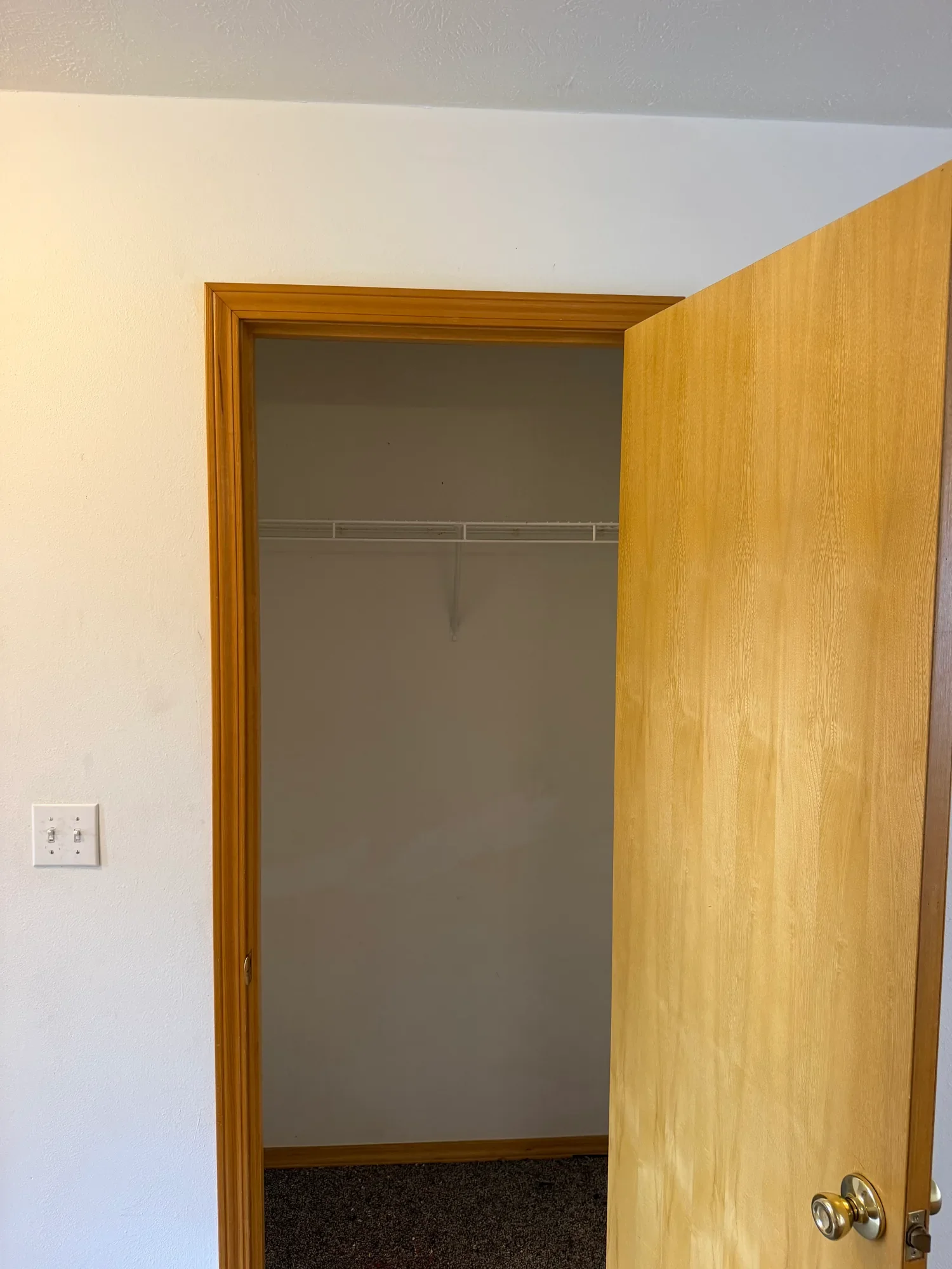  Reach-in closet with shelf and hanging rod 