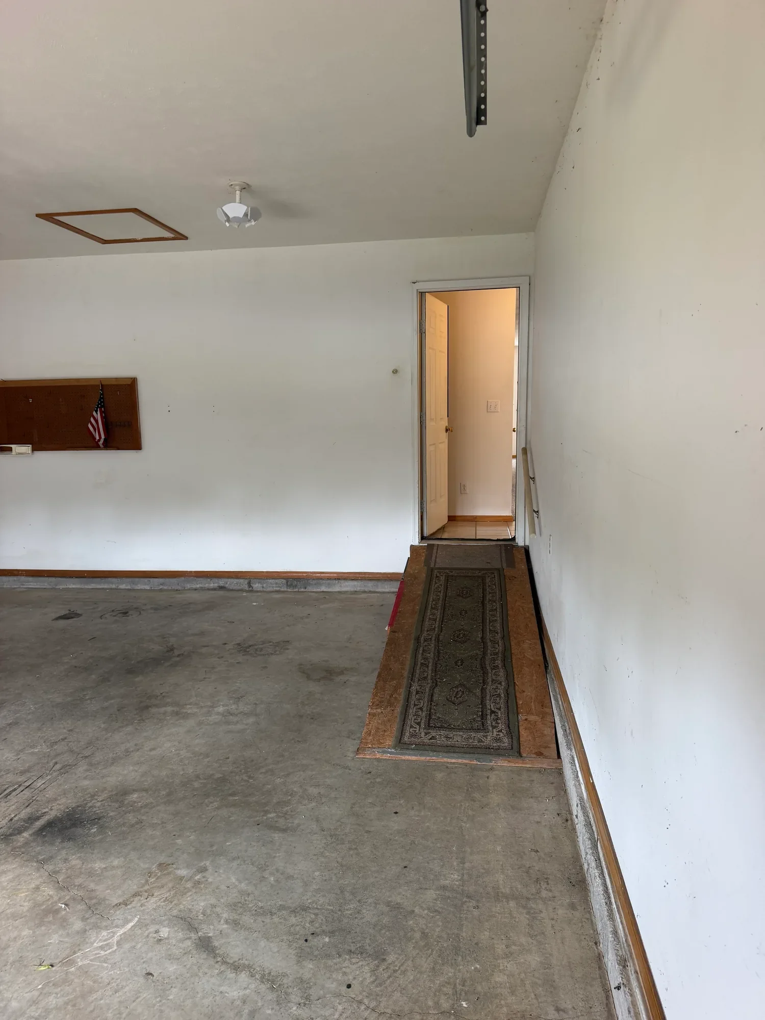  Garage with entry door into the home 