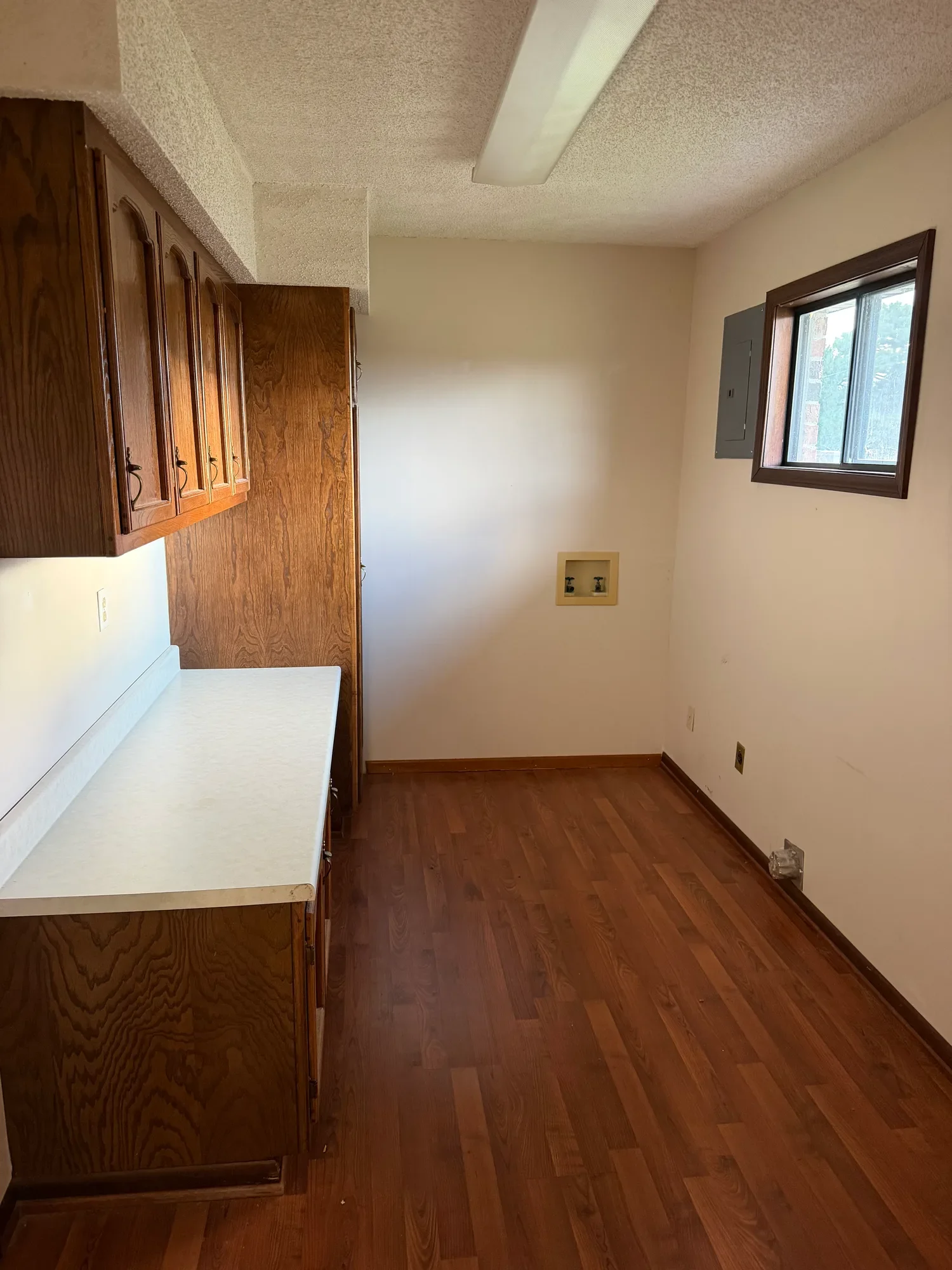  Laundry area with washer and dryer hookups and counter space 