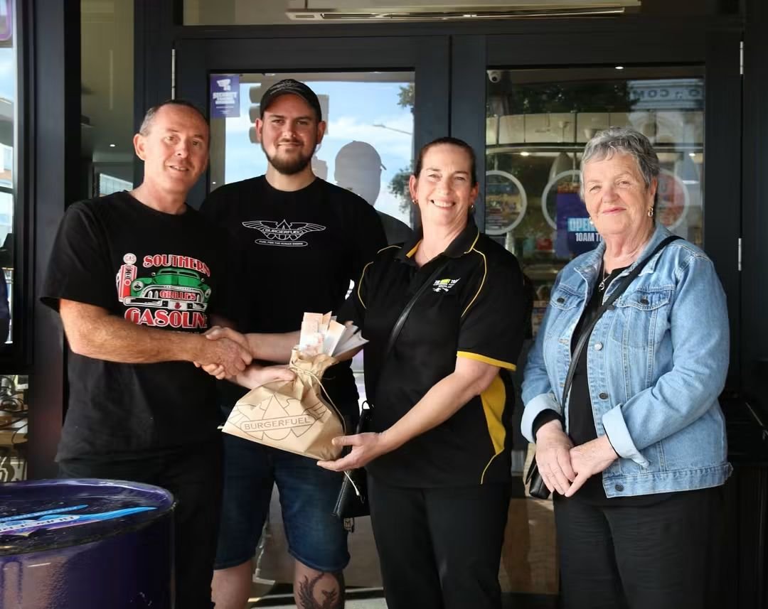 Southern Grilles and Gasoline handing off funds raised to Eduk8: The Right Track