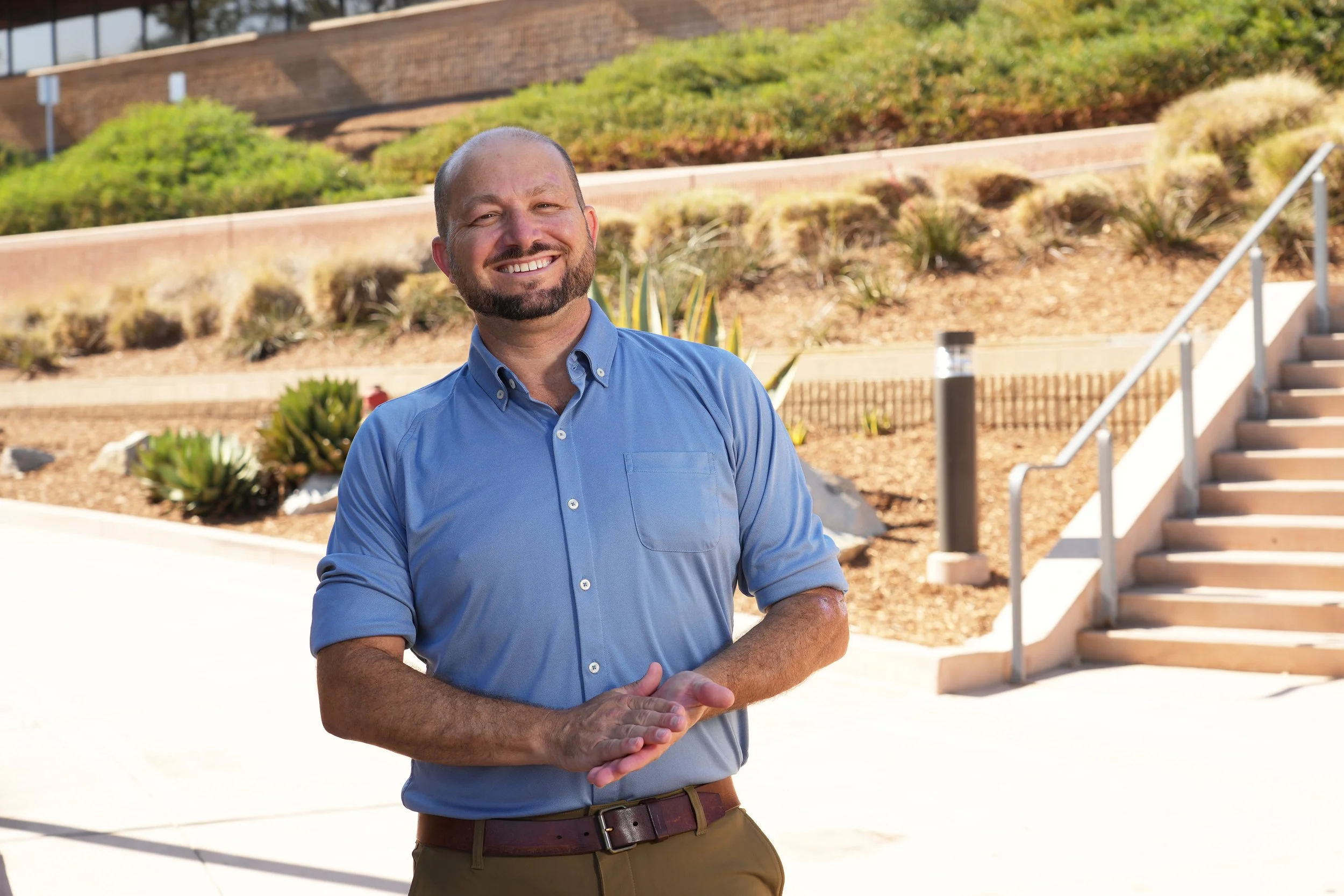 Justin Moodie in front of Torrey Pines High School.
