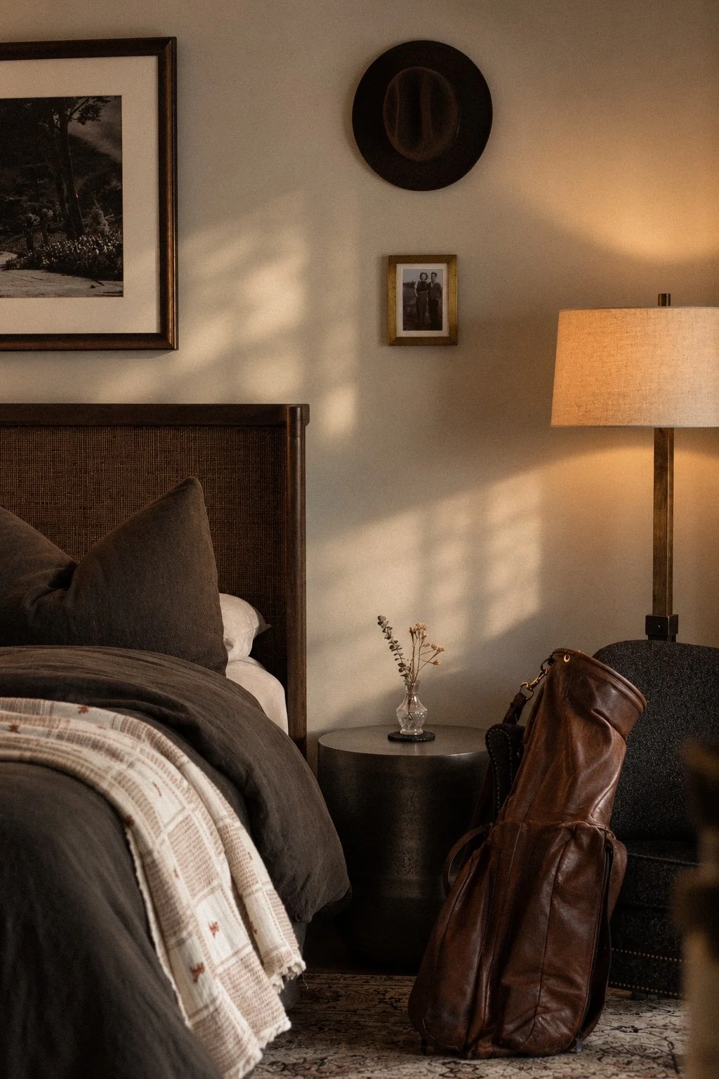 By pairing a meticulously styled bed with personal artifacts and natural light, Iris crafts an intimate, lived-in sanctuary where every texture serves both comfort and identity.