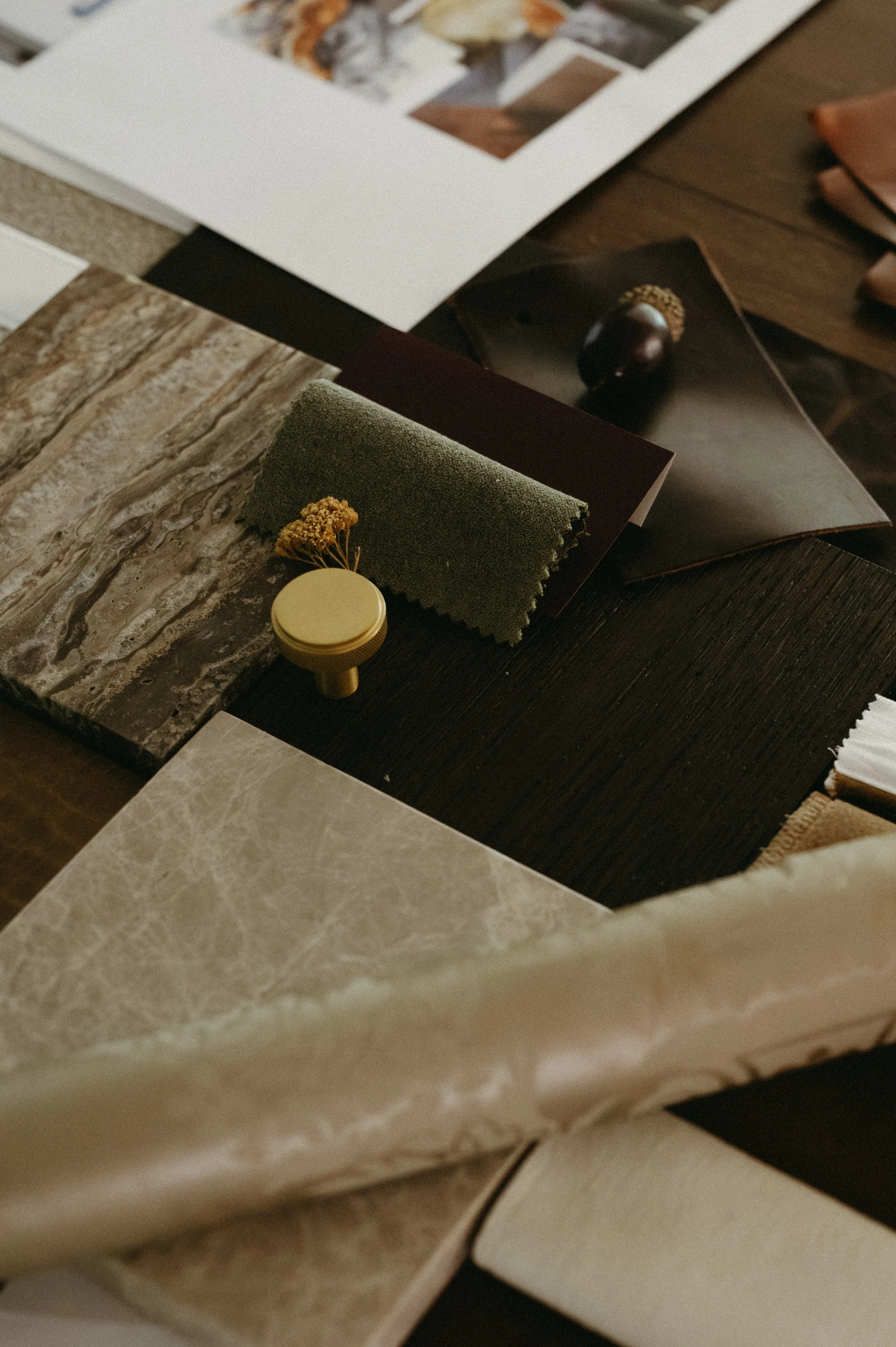 Beautiful palette showcasing swatches including marble, wood, velvet fabric, and ceramic tiles.