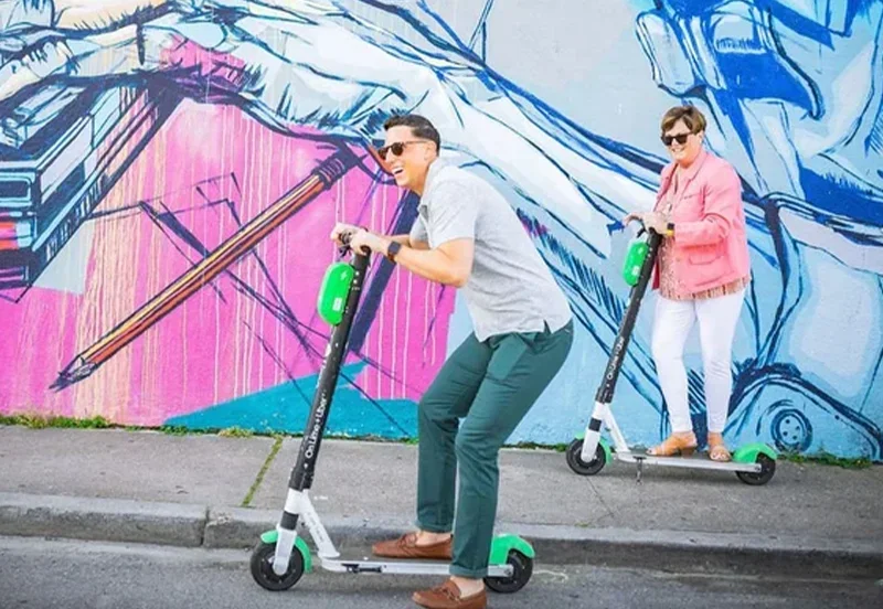 Riding scooters through the community