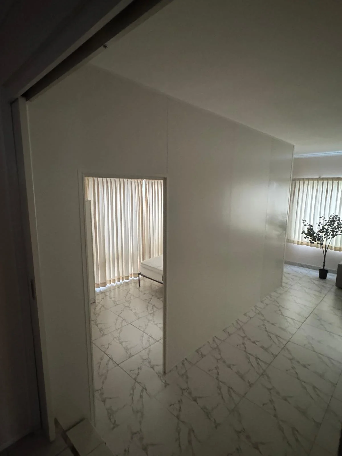 Insulated partition wall creating an additional bedroom in a Sydney home