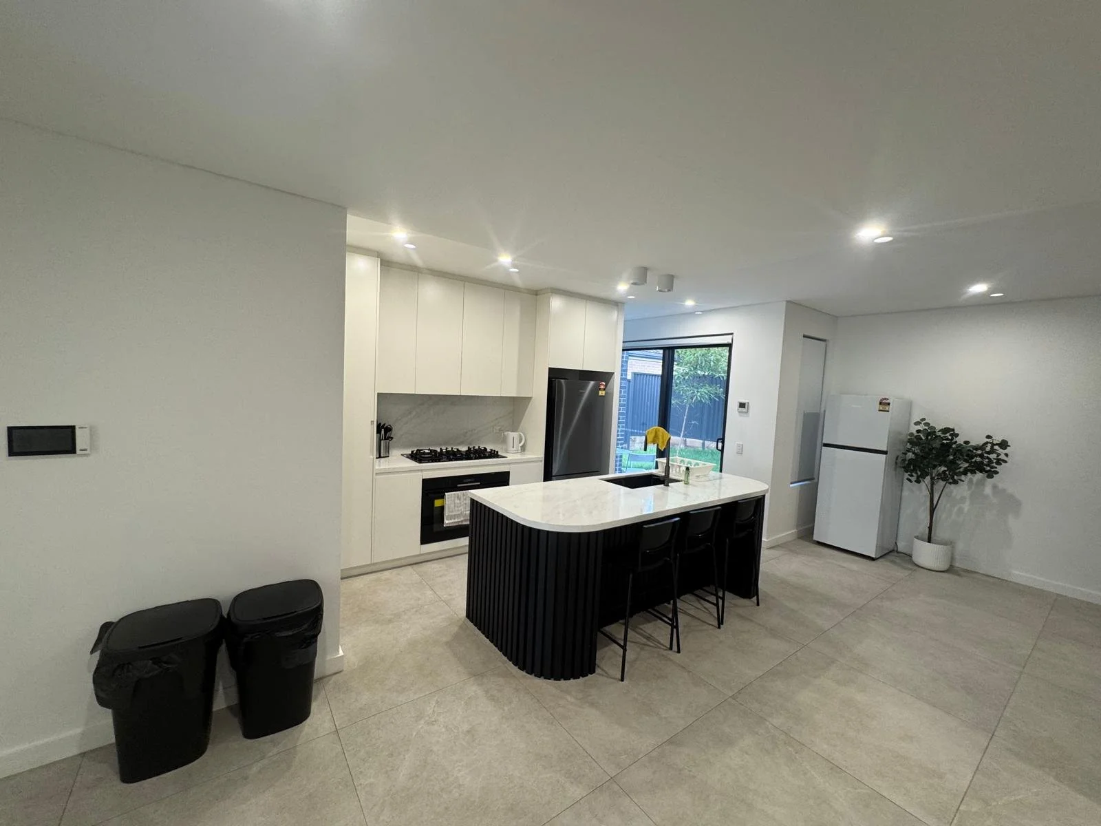 Modern full kitchen set up as part of a complete turnkey solution to get this co-living property tenant ready