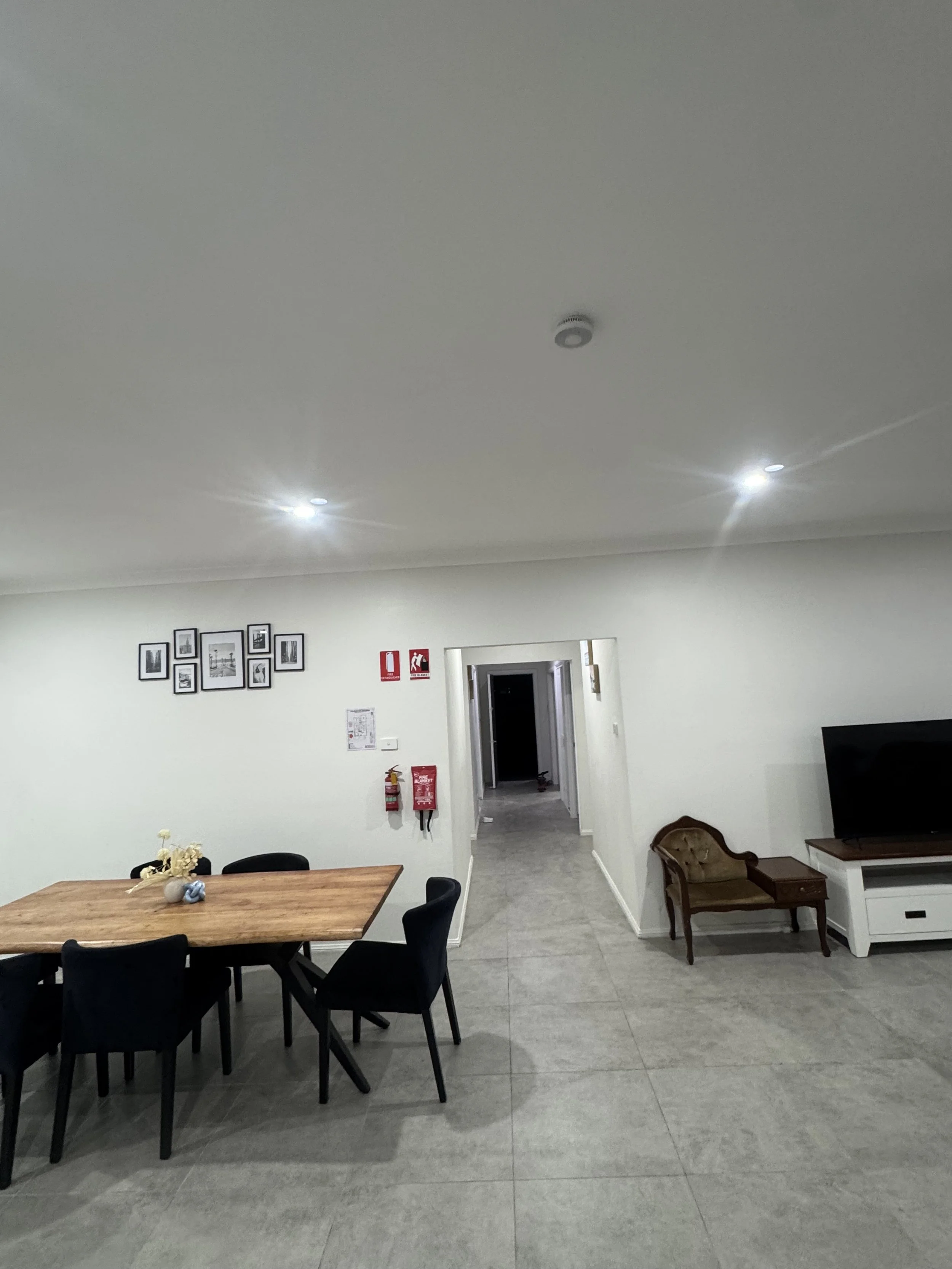 Interconnected smoke alarms and fire safety equipment installed in a Sydney co-living property at Guildford