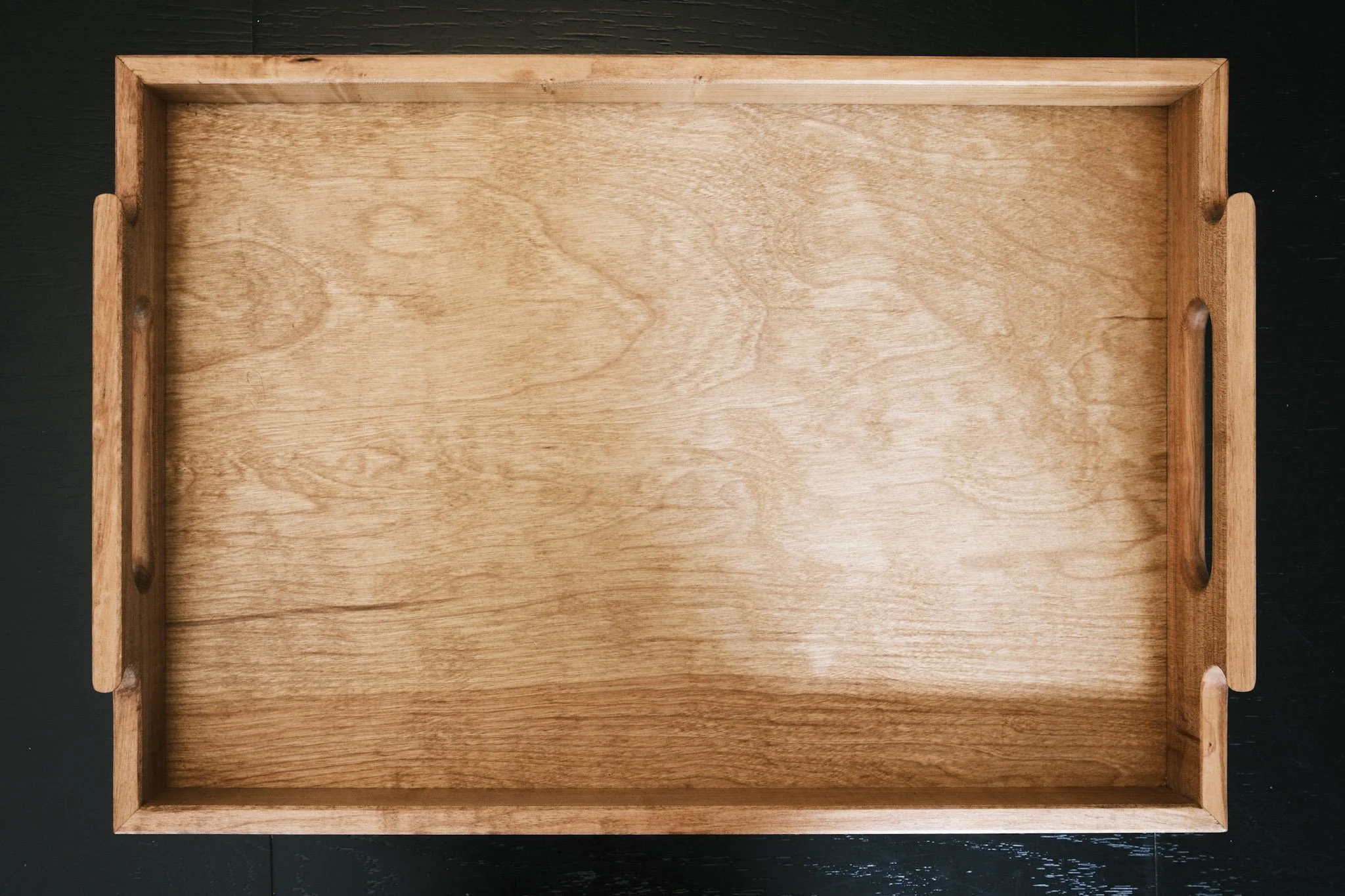 Figured maple brings natural character to the finished piece. 