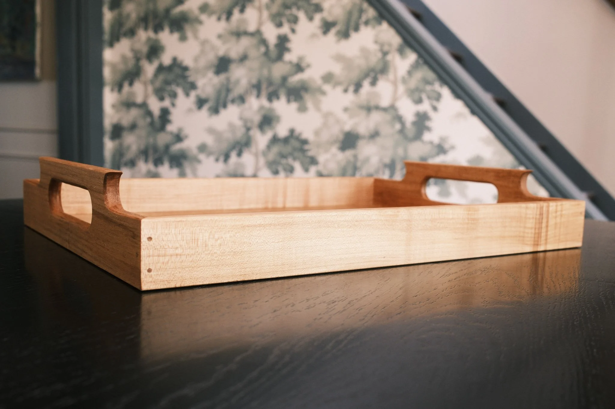 Designed and built from solid maple, with thoughtful details and a simple form that lets the natural wood shine.