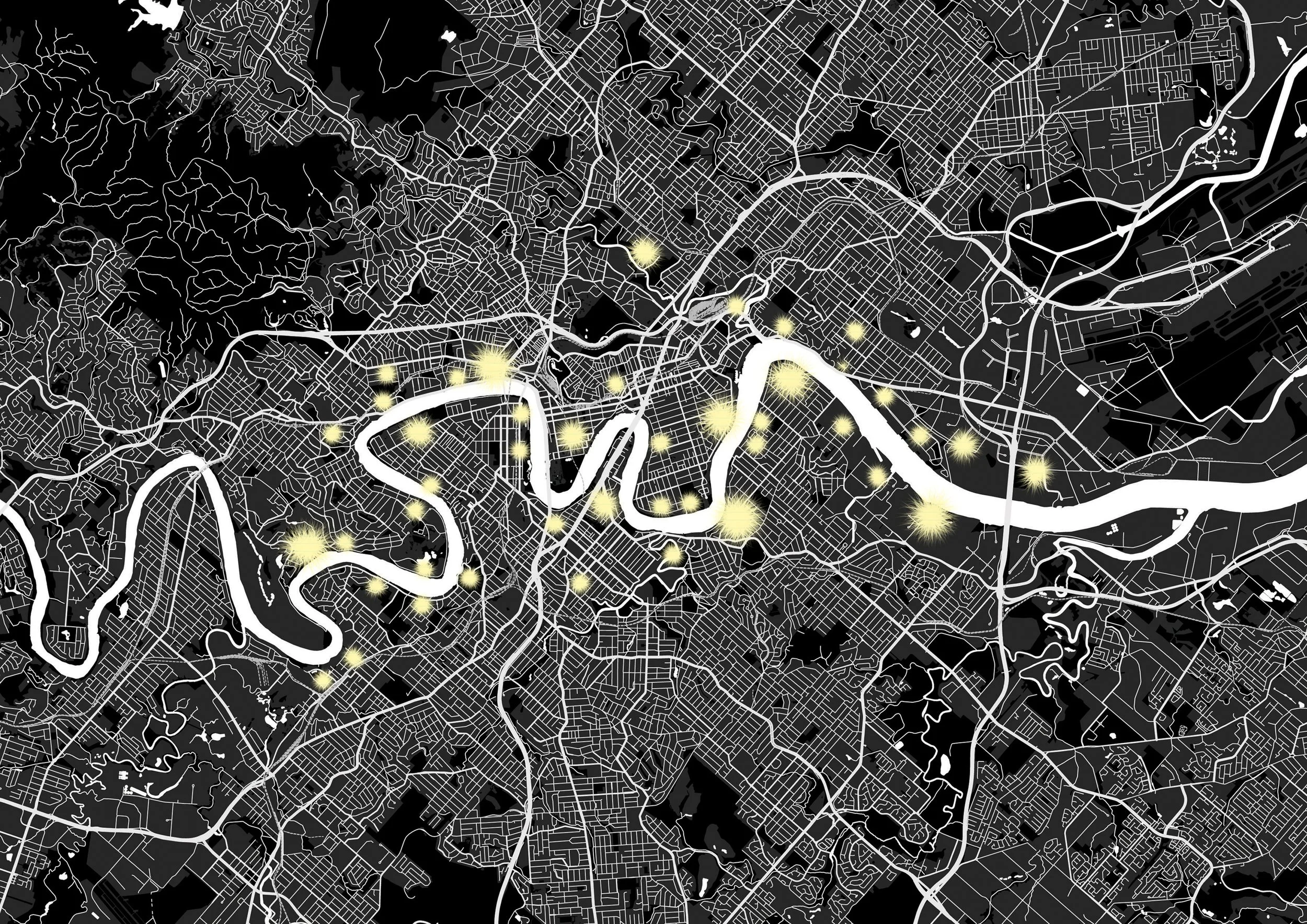 A detailed map of a city with streets, highways, and rivers, highlighted with bright yellow points indicating specific locations.