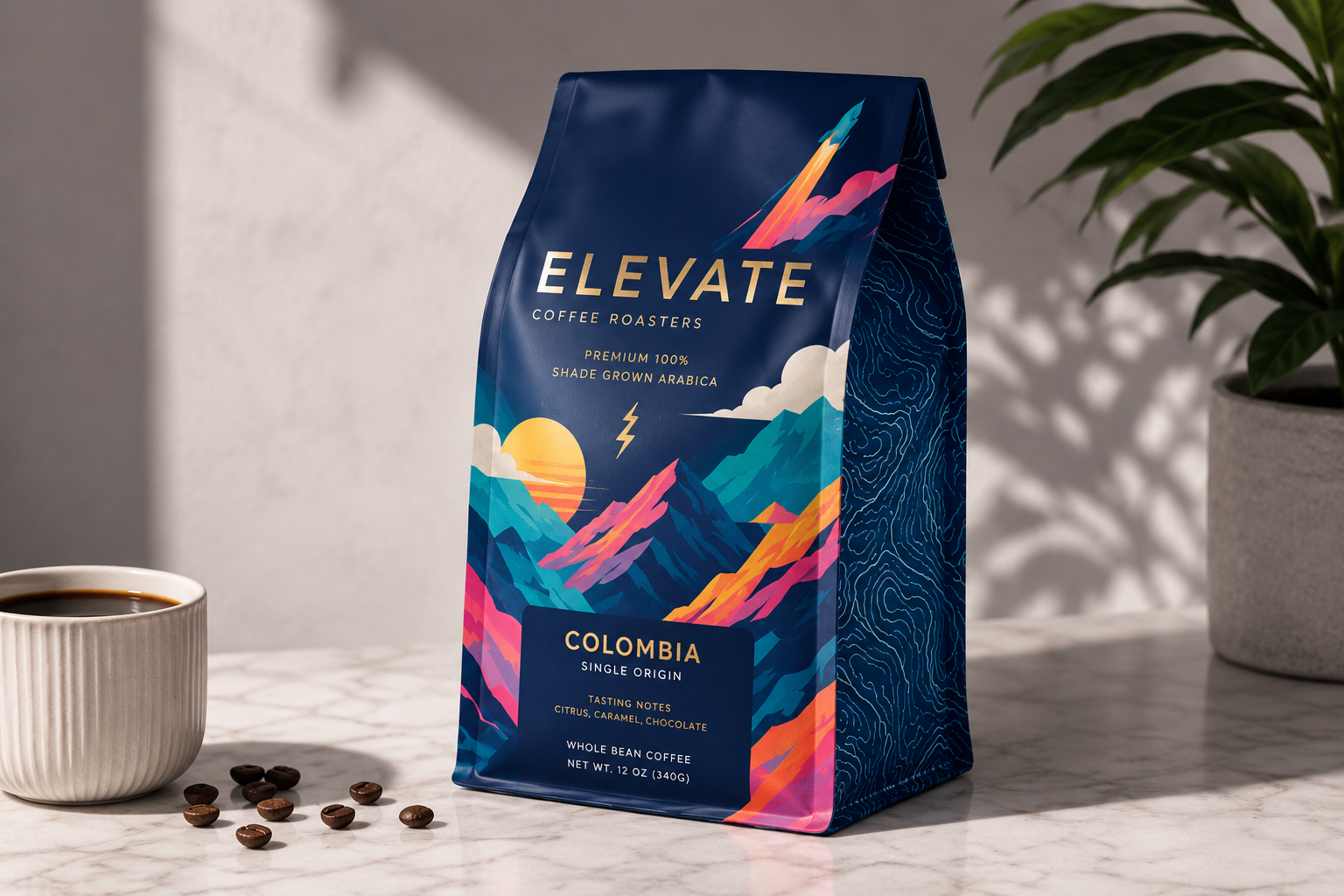 A bag of Elevate Colombian coffee on a marble surface with a cup of coffee and scattered coffee beans nearby, and a potted plant in the background.